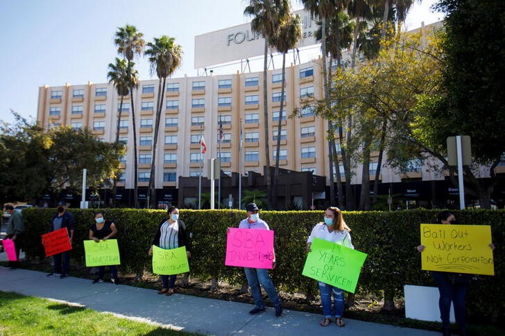 Laid-off hospitality workers protest outside closed hotel in Los Angeles