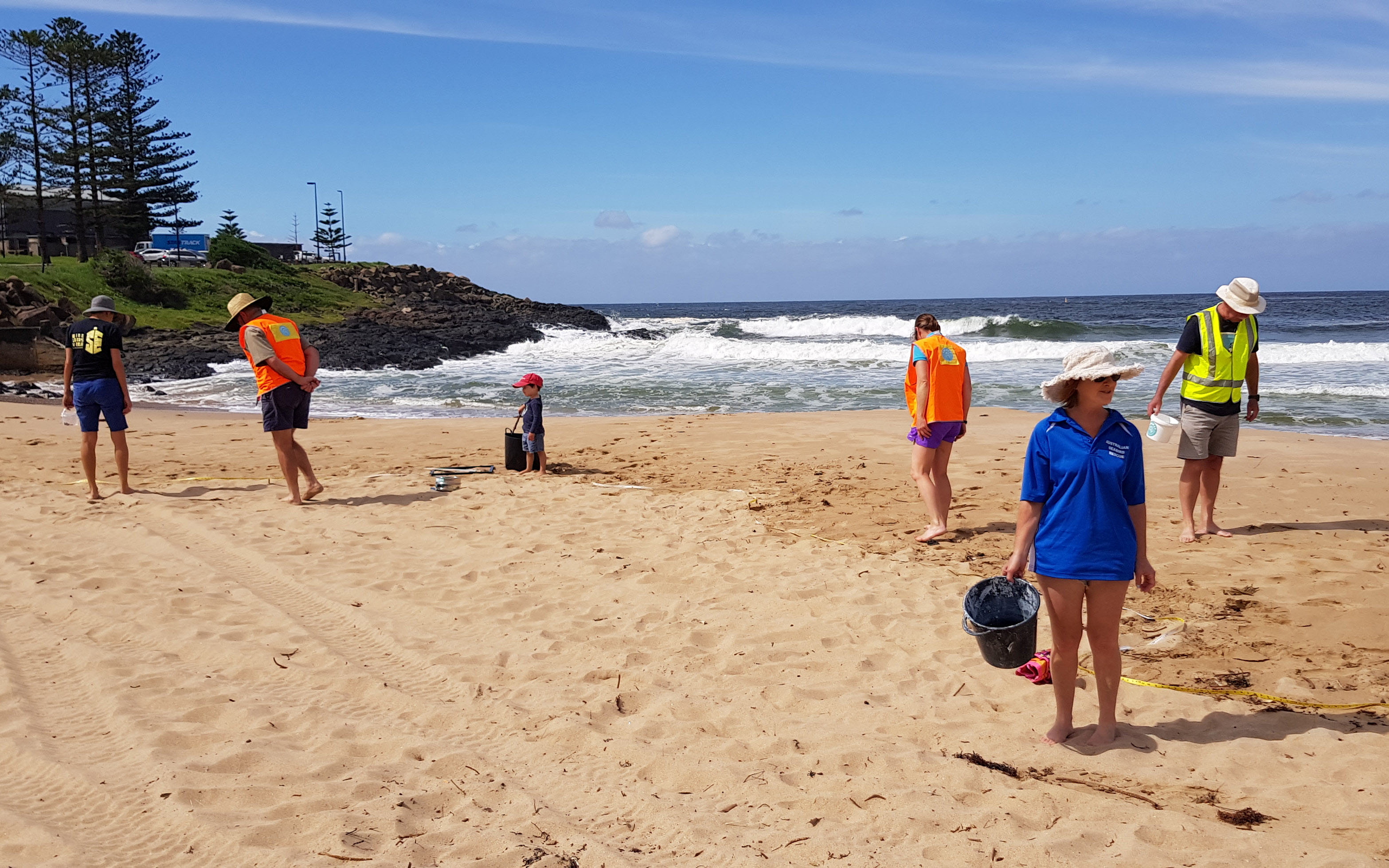 Citizen scientists conduct a AUSMAP microplastic survey on Surf Beach in Kiama