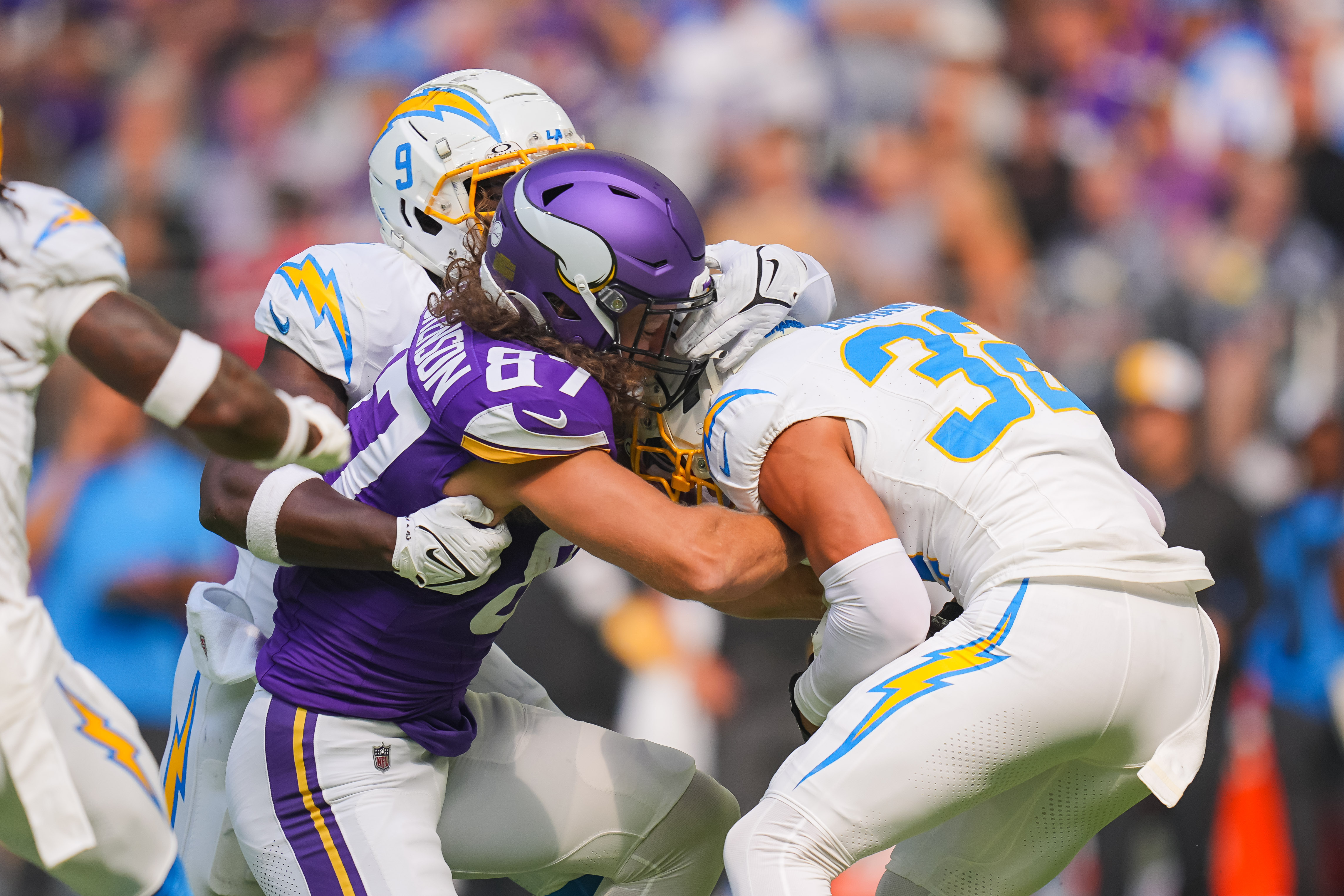 Chargers survive cliff-hanger with Vikings on end zone pick