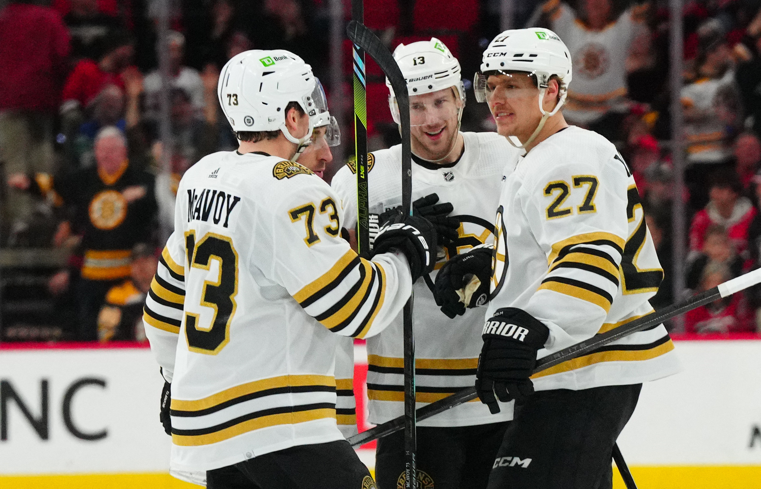 Brad Marchand's 400th goal fuels Bruins past Hurricanes | Reuters