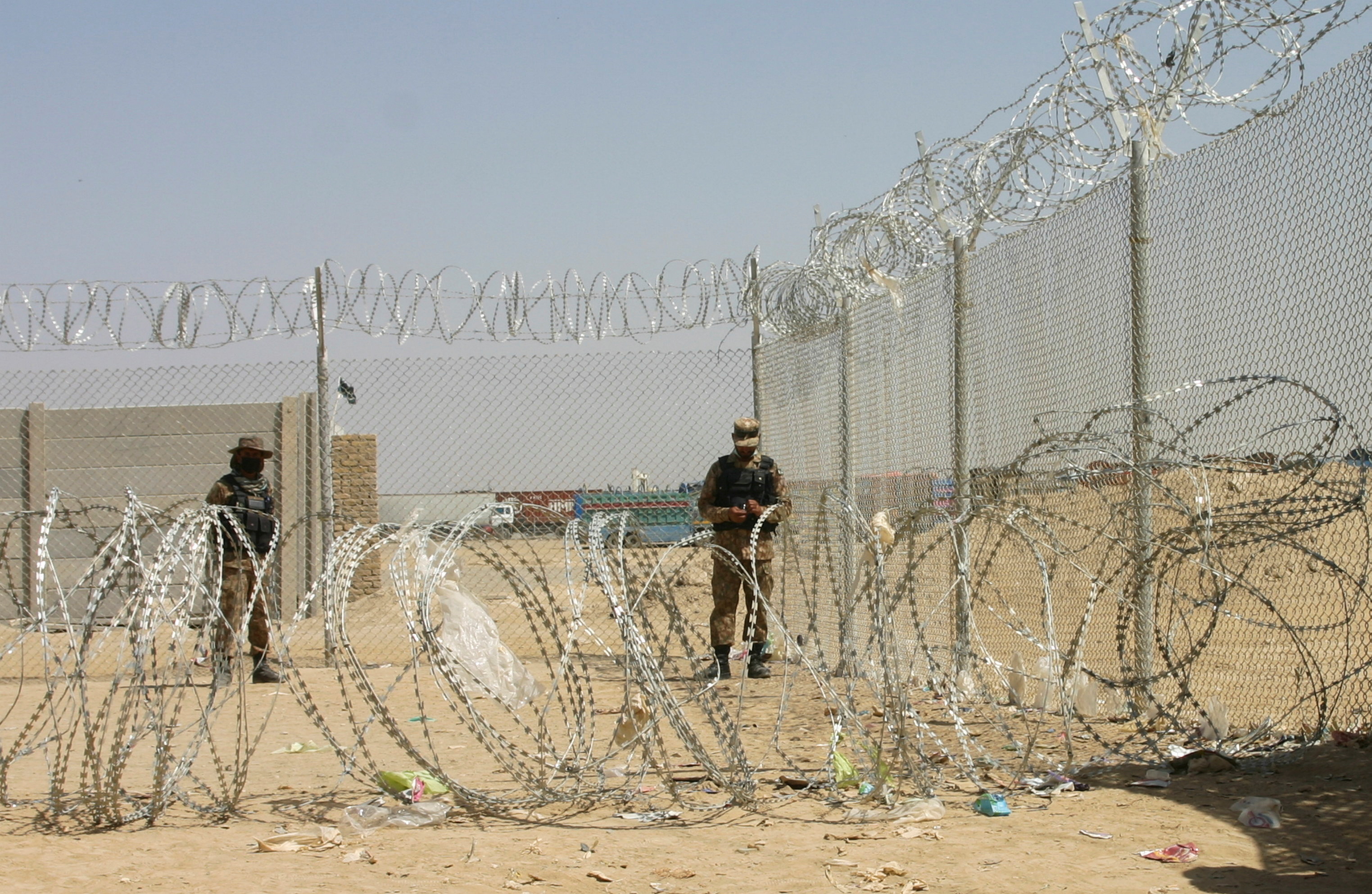 Army soldiers stand guard during a temporary closure of the Friendship Gate crossing point at the Pakistan-Afghanistan border town of Chaman