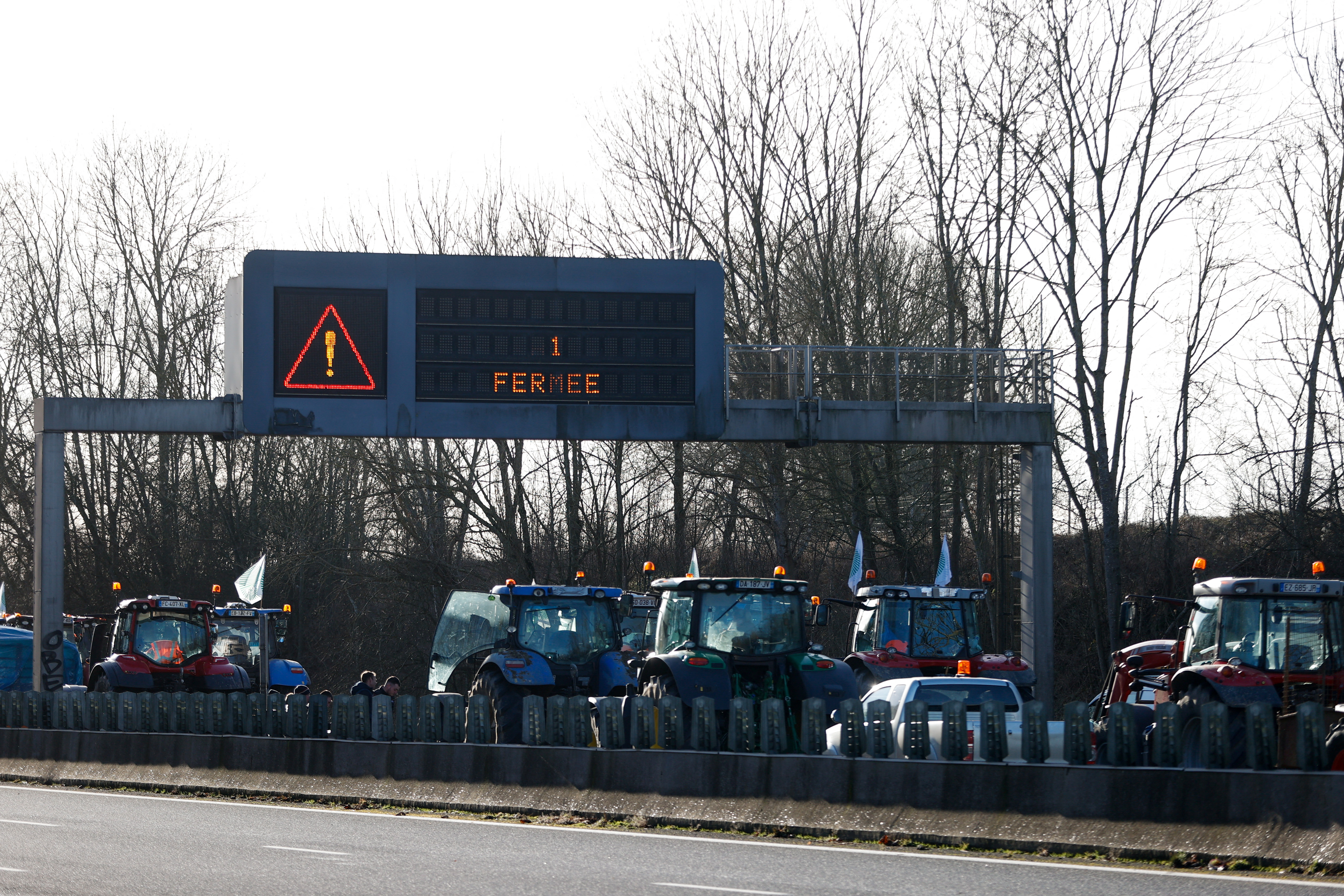 French farmers block road linking France and Spain Reuters