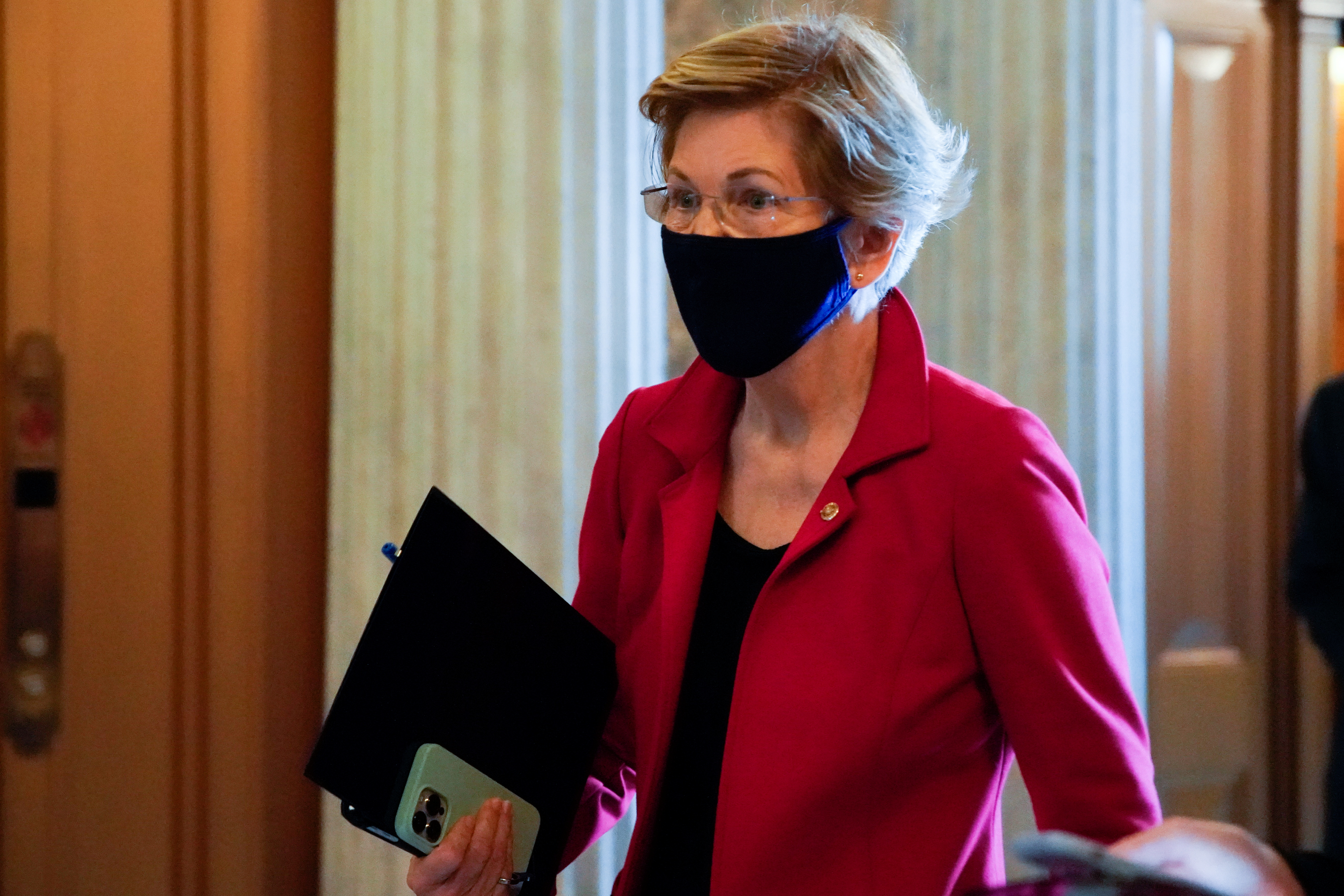 U.S. Senator Elizabeth Warren (D-MA) walks to the Senate floor during a vote at the U.S. Capitol in Washington