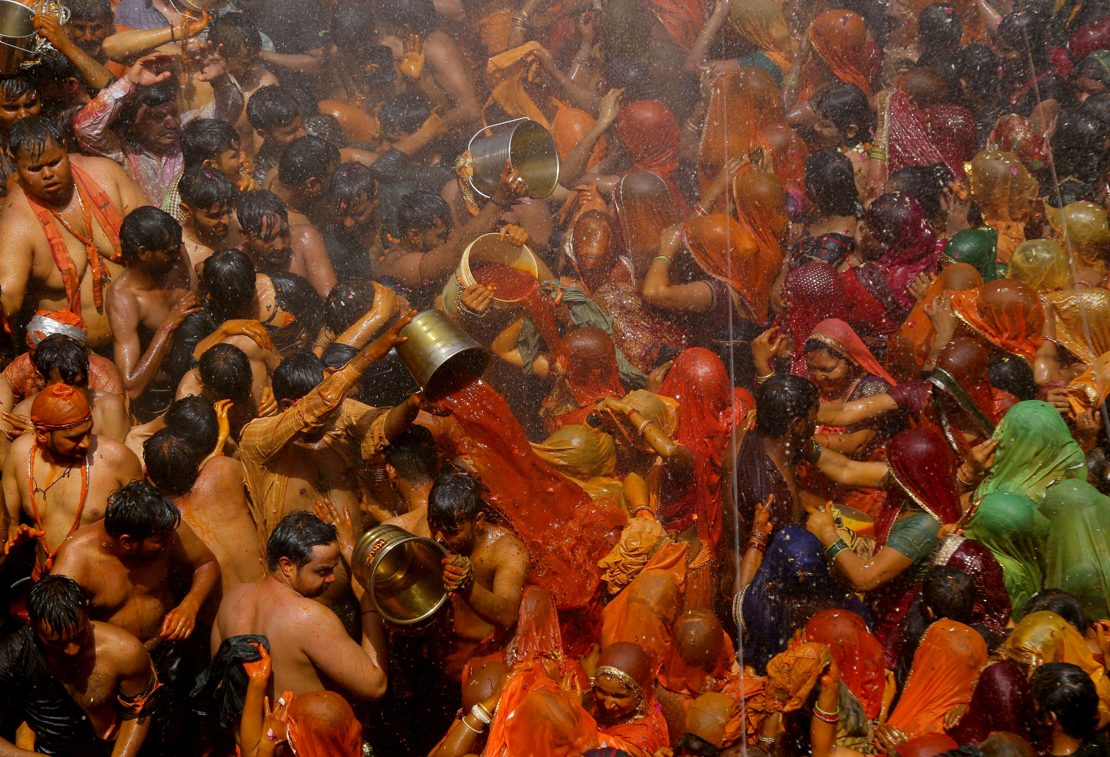 Hindu devotees take part in 'Huranga' at Dauji temple near Mathura