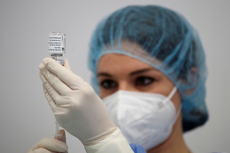 A nurse prepares a dose of AstraZeneca coronavirus disease (COVID-19) vaccine in Fasano Italy, April 13, 2021. REUTERS/Alessandro Garofalo/File Photo