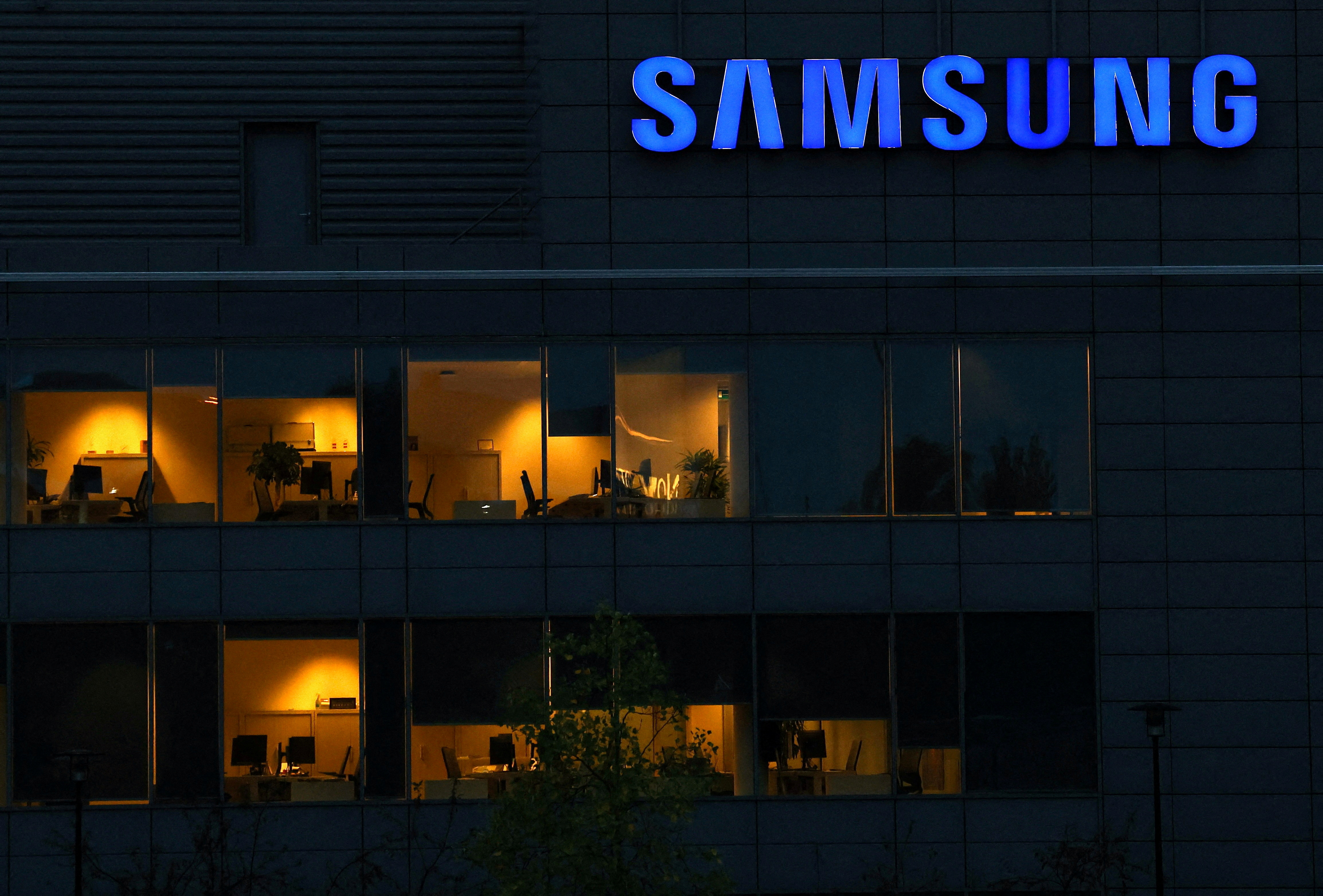 The logo of Samsung is seen on the top of a Brussels' office of the company in Diegem