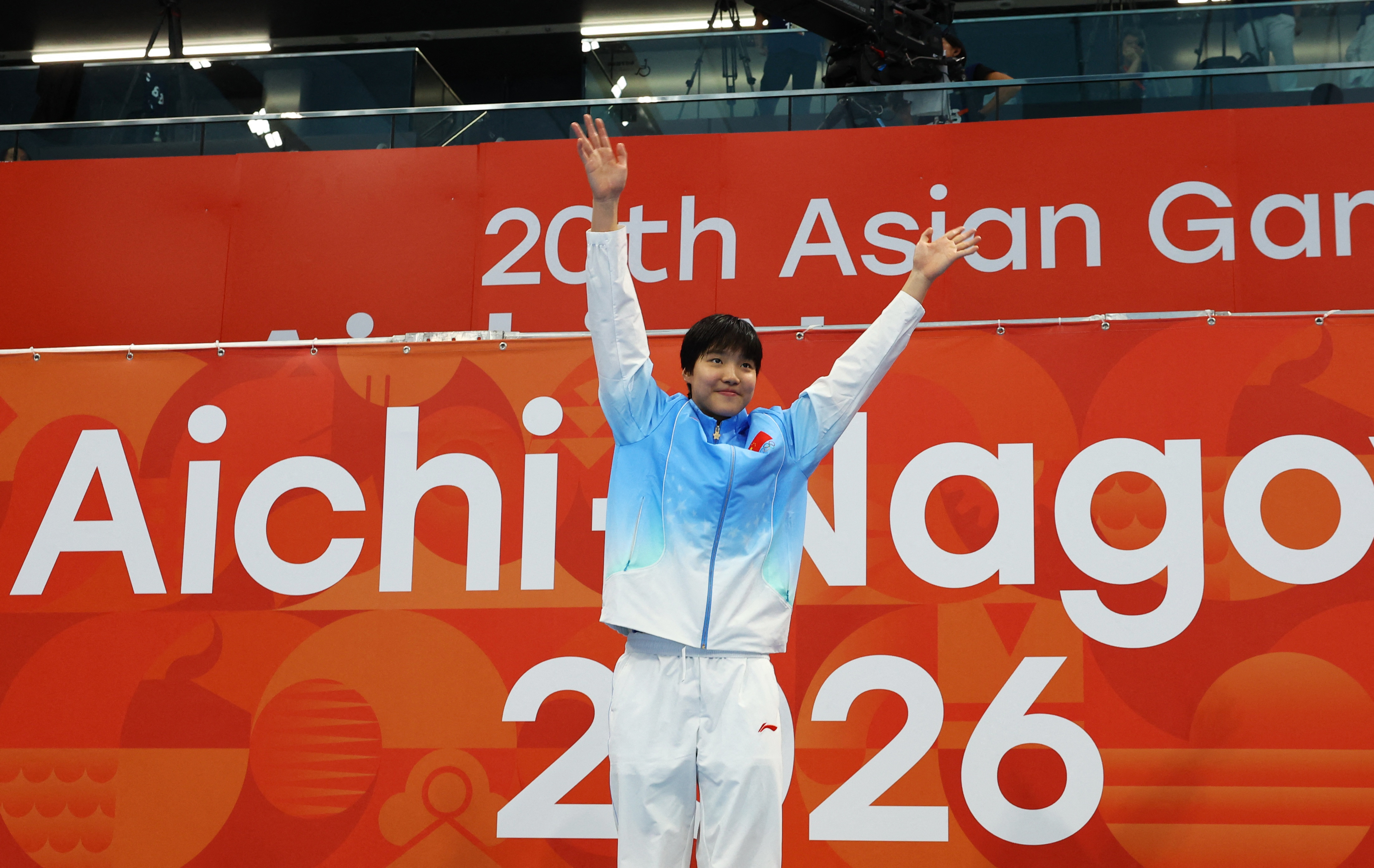 China's 13-year-old Yu smashes Asian record for stunning 200m