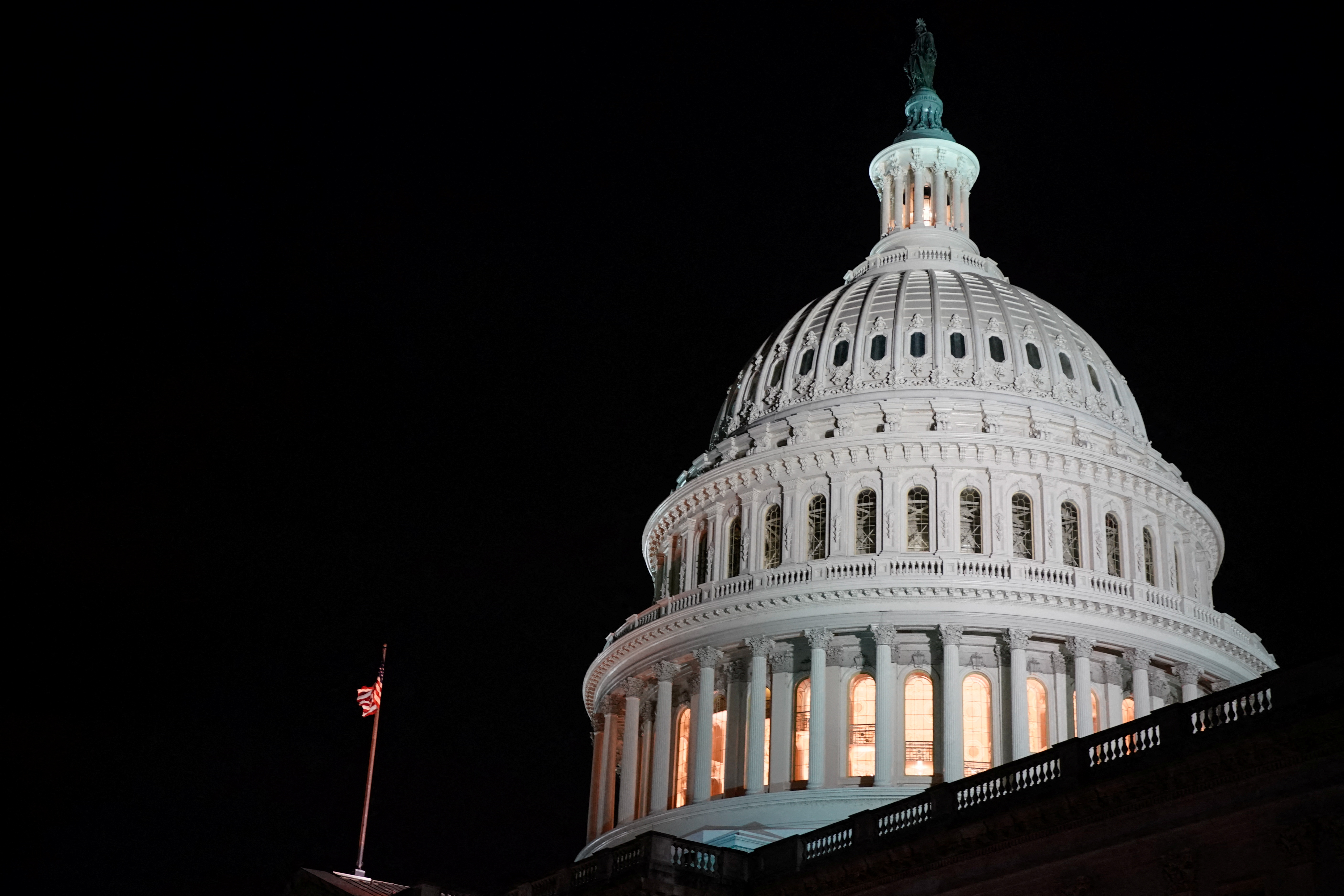 The U.S. Capitol dome is seen at night in Washington