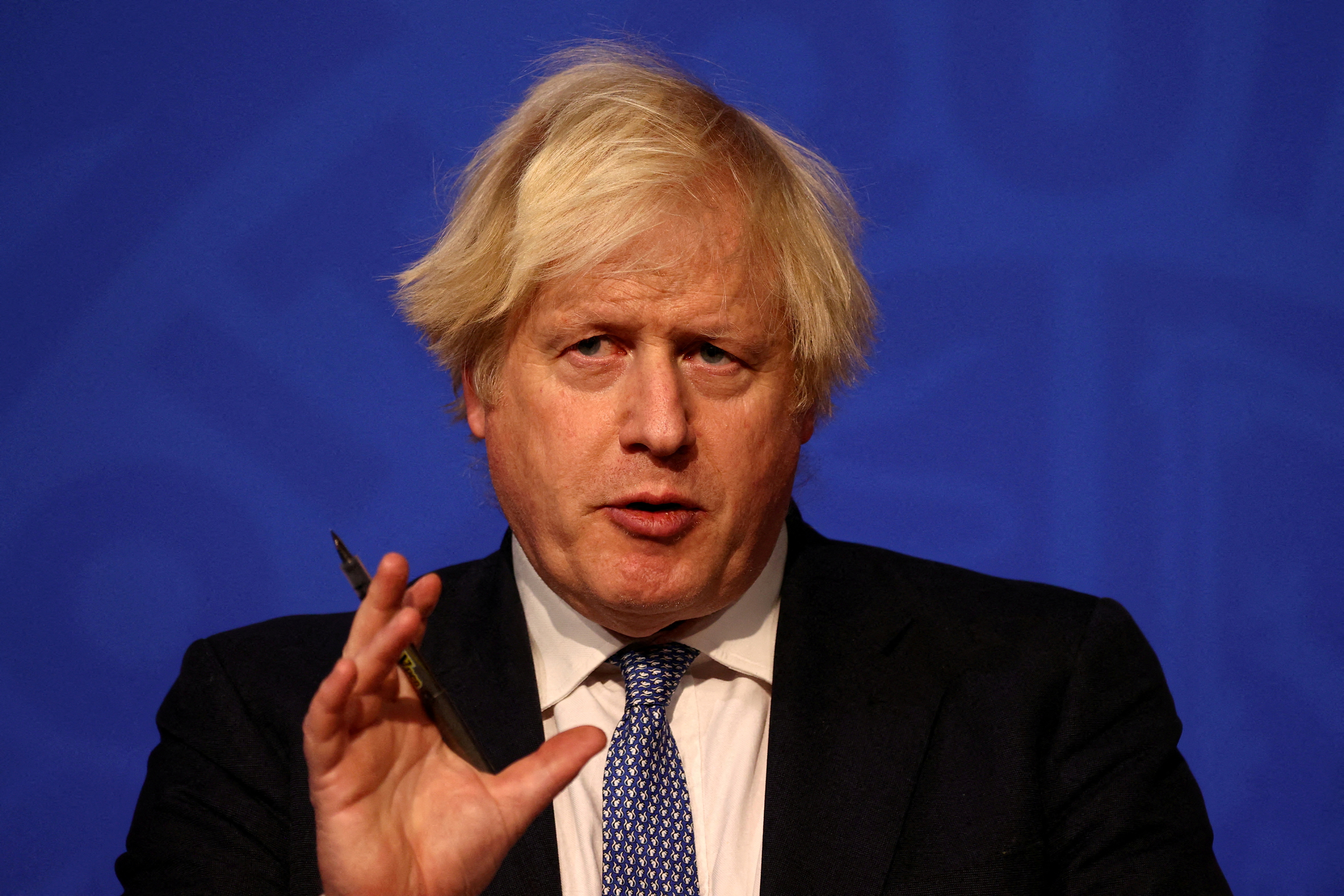 British Prime Minister Boris Johnson holds a news conference, in London