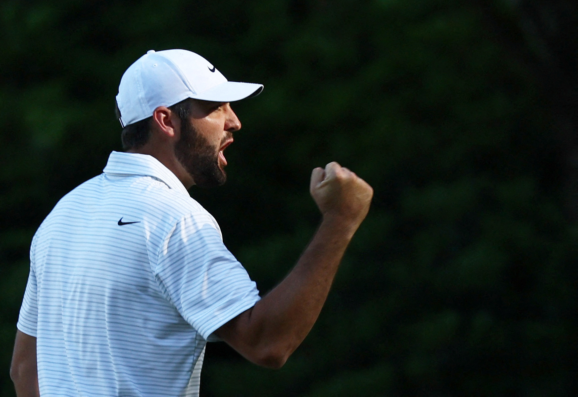 Scheffler takes Green Jacket after Amen Corner bares teeth | Reuters