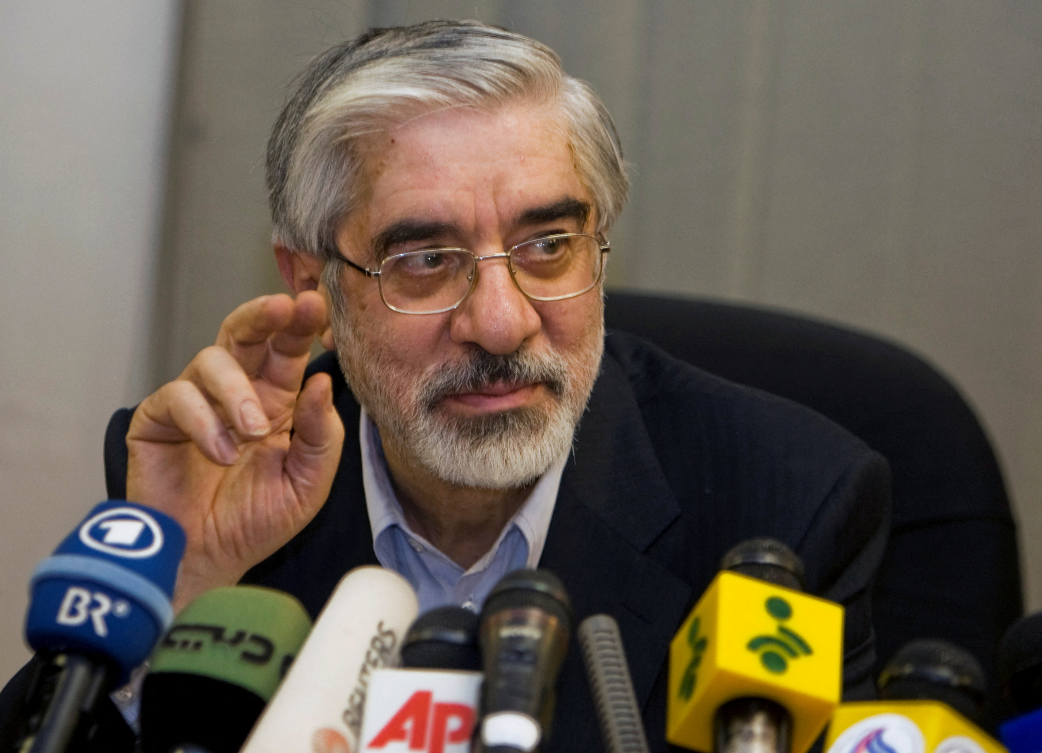 Iran's presidential election candidate Mirhossein Mousavi speaks during news conference in Tehran