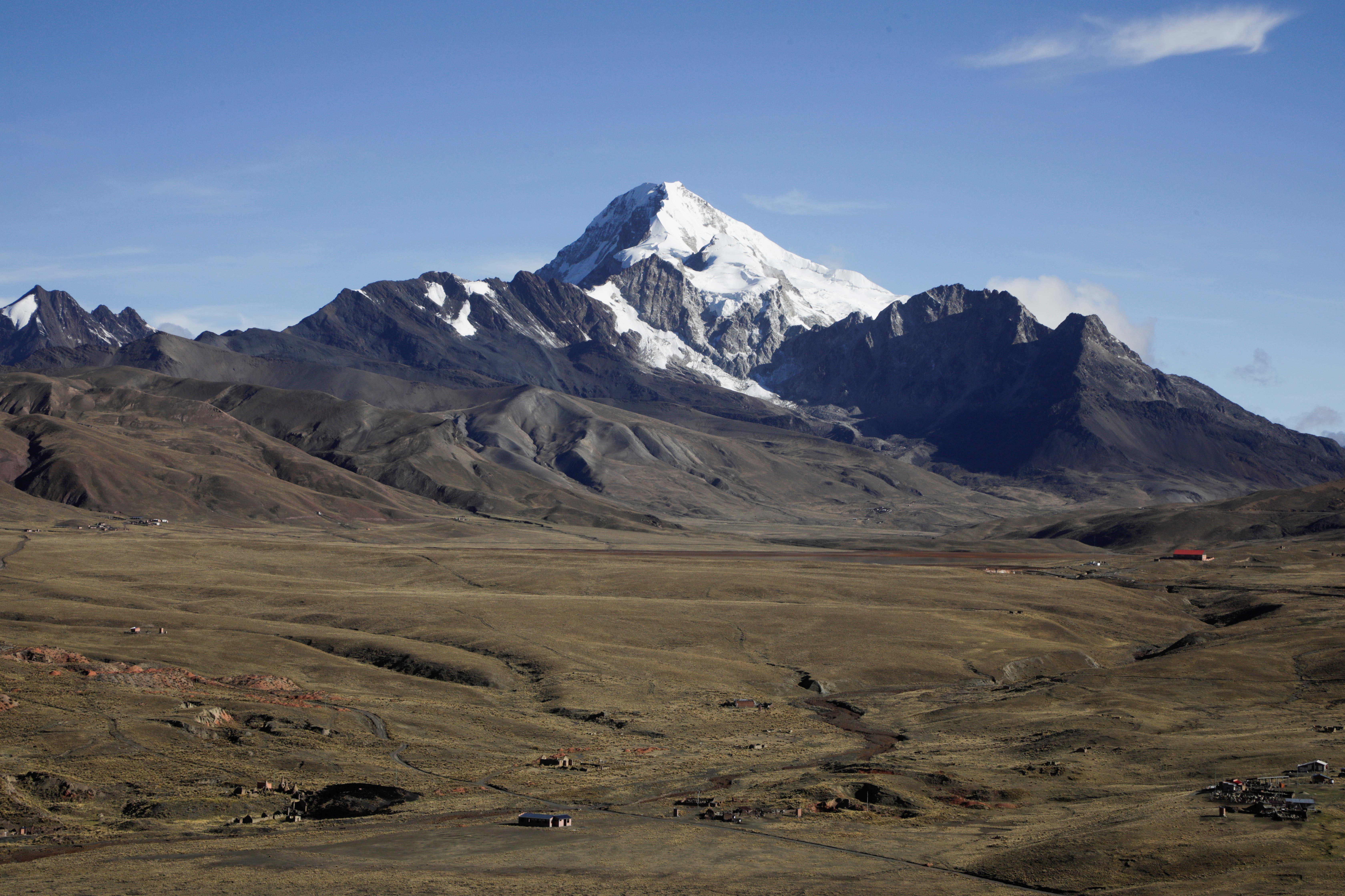 The Huayna Potosi mountain is seen without its glaciers and with little snow, in Milluni
