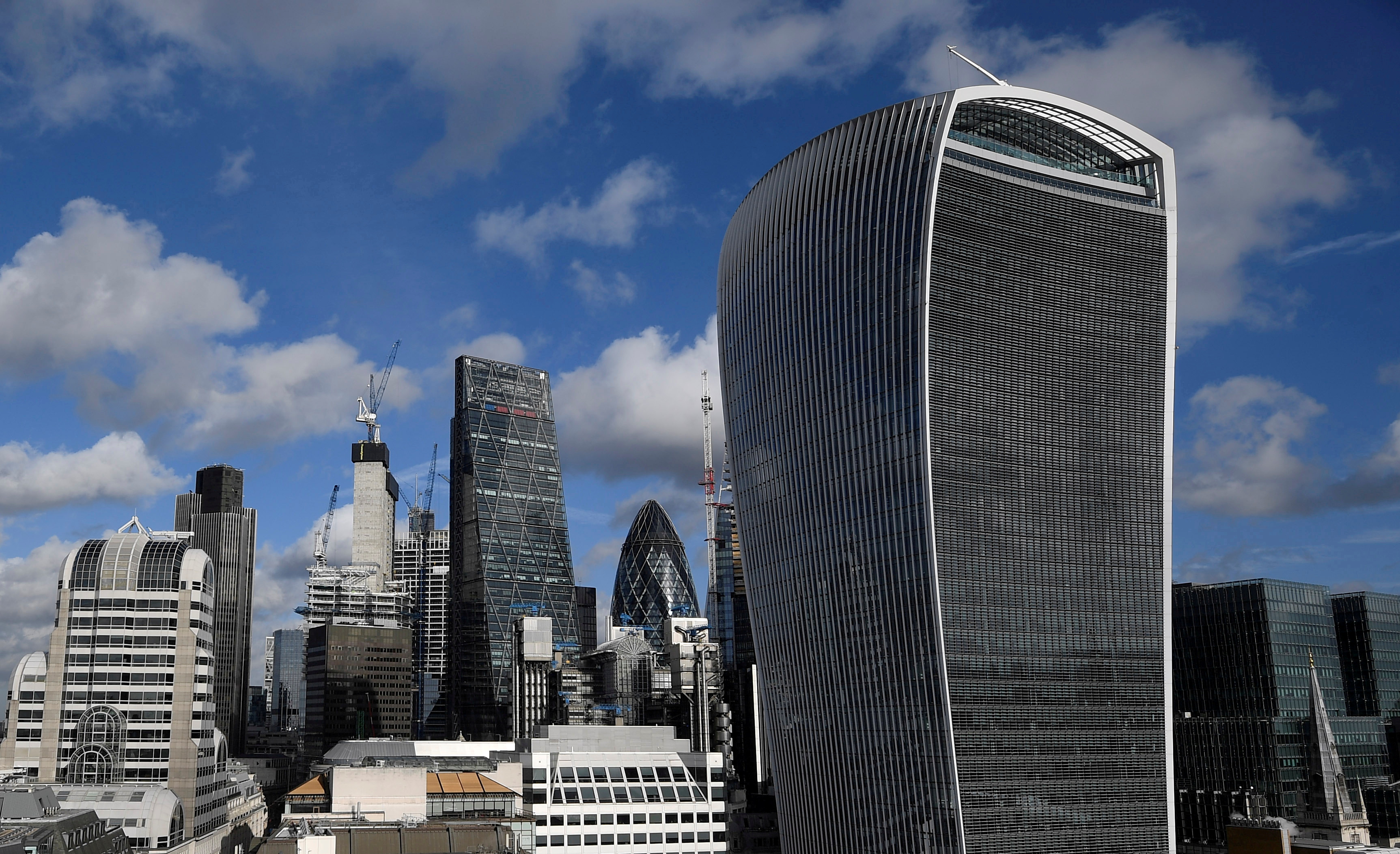 The City of London financial district is seen with office skyscrapers commonly known as 'Cheesegrater', 'Gherkin' and 'Walkie Talkie' seen in London, Britain
