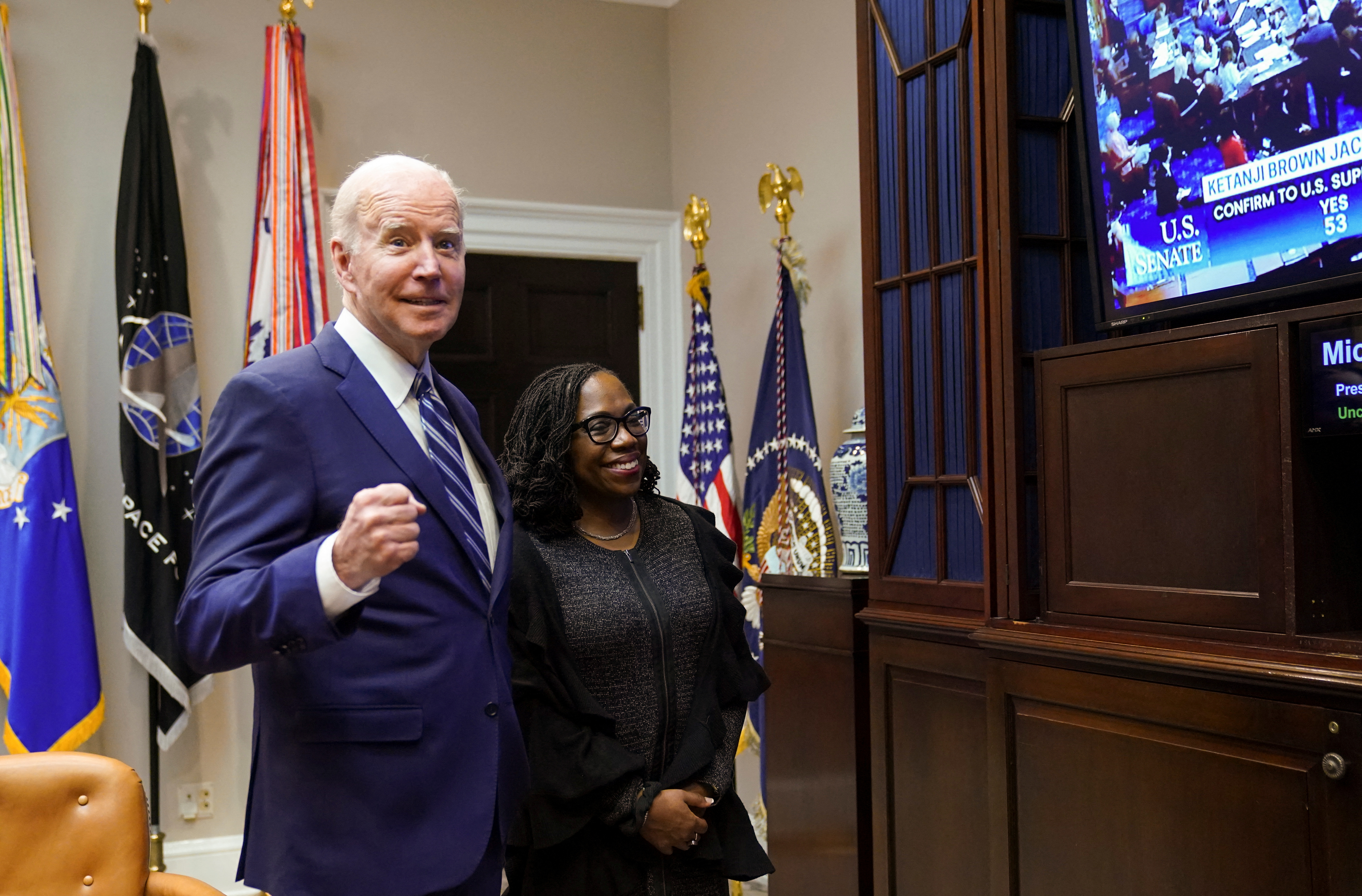 U.S. President Joe Biden and Judge Ketanji Brown Jackson watch as Senate votes to confirm Jackson's nomination to the U.S. Supreme Court, from the White House in Washington
