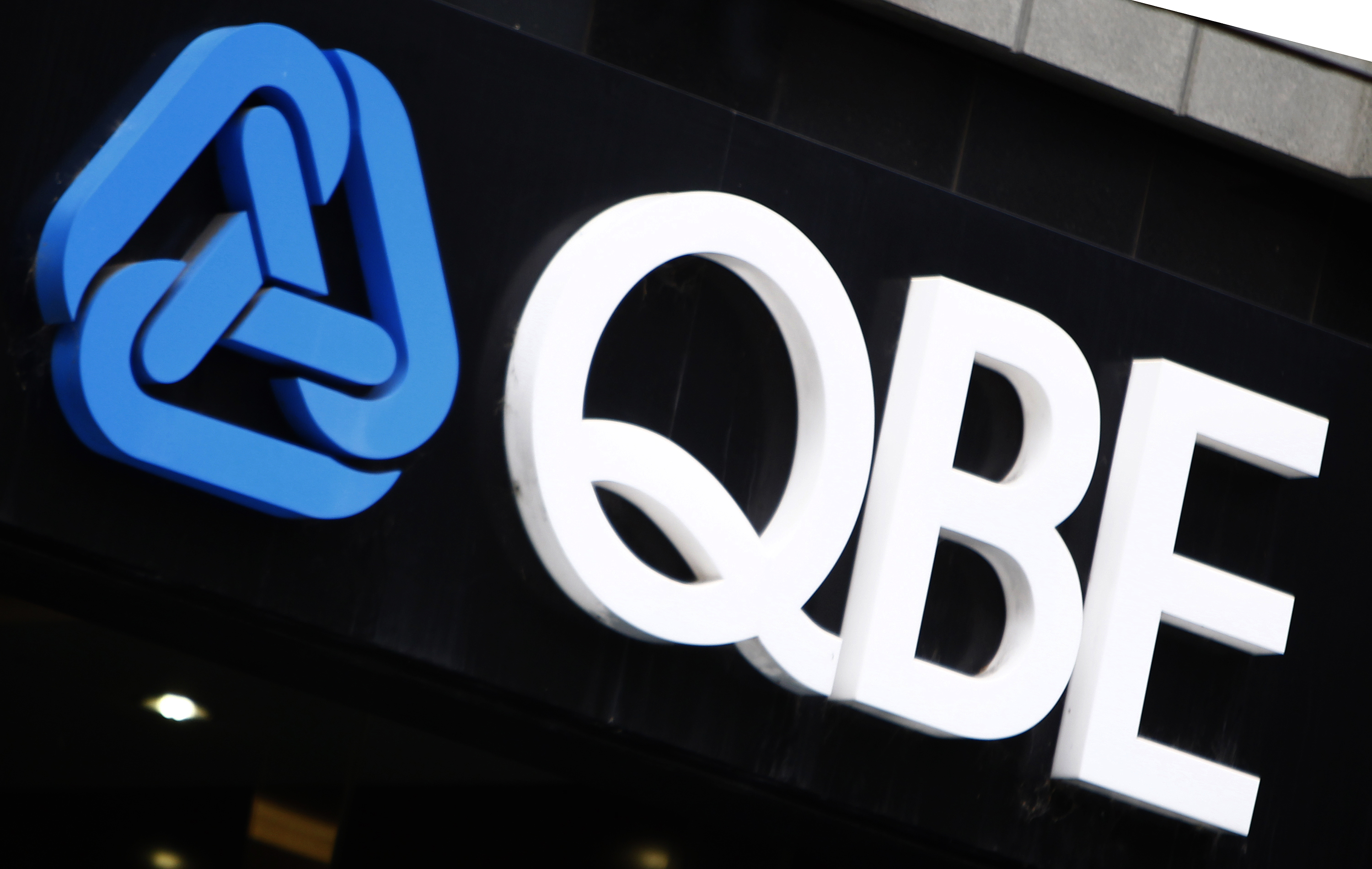 The QBE Insurance logo is seen on an office building in Melbourne