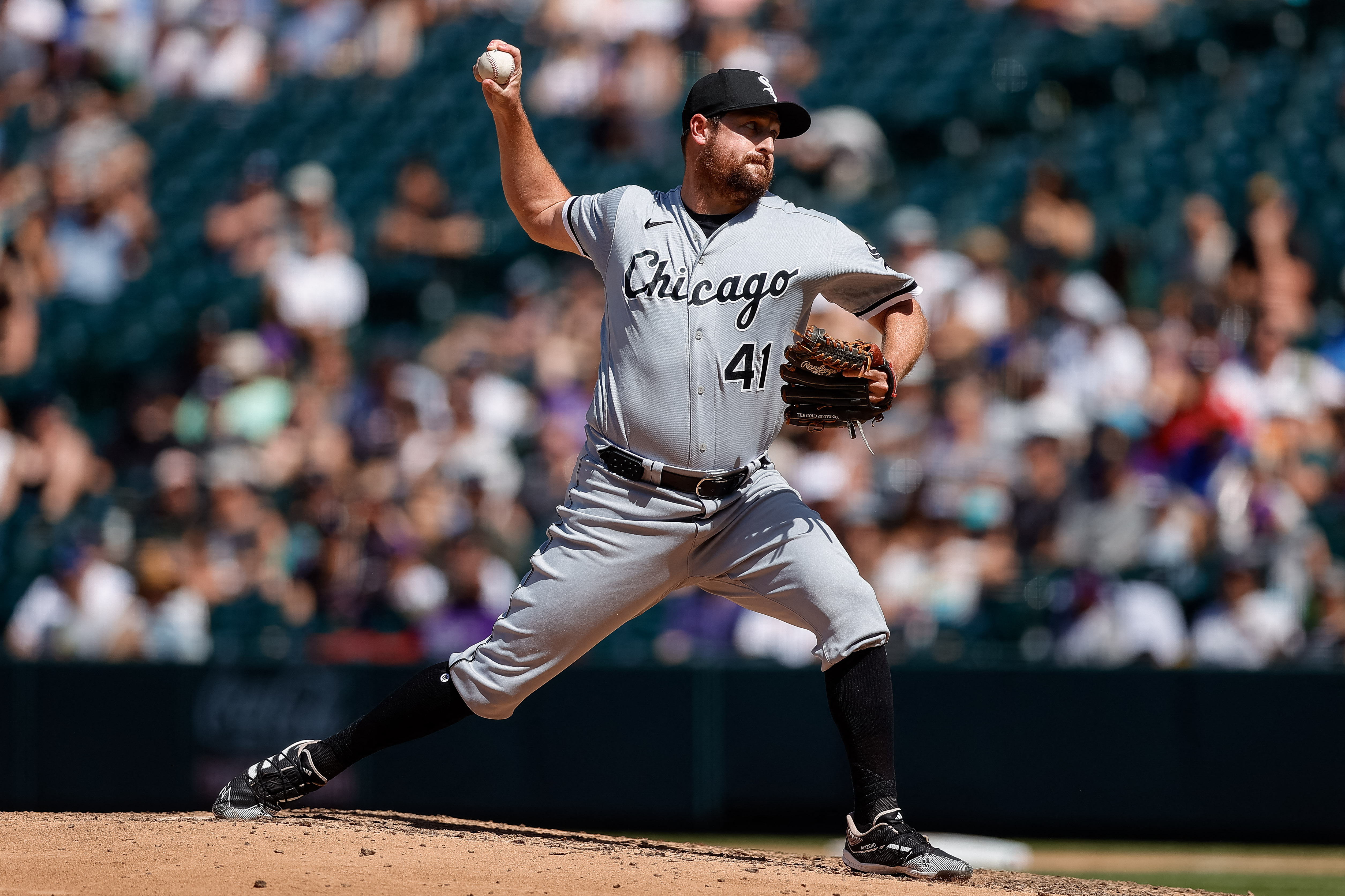 Chicago White Sox third baseman Yoan Moncada (10) swings at the pitch in an  MLB baseball game against the Colorado Rockies, Sunday, Aug. 20, 2023. The  White Sox defeated the Rockies 10-5