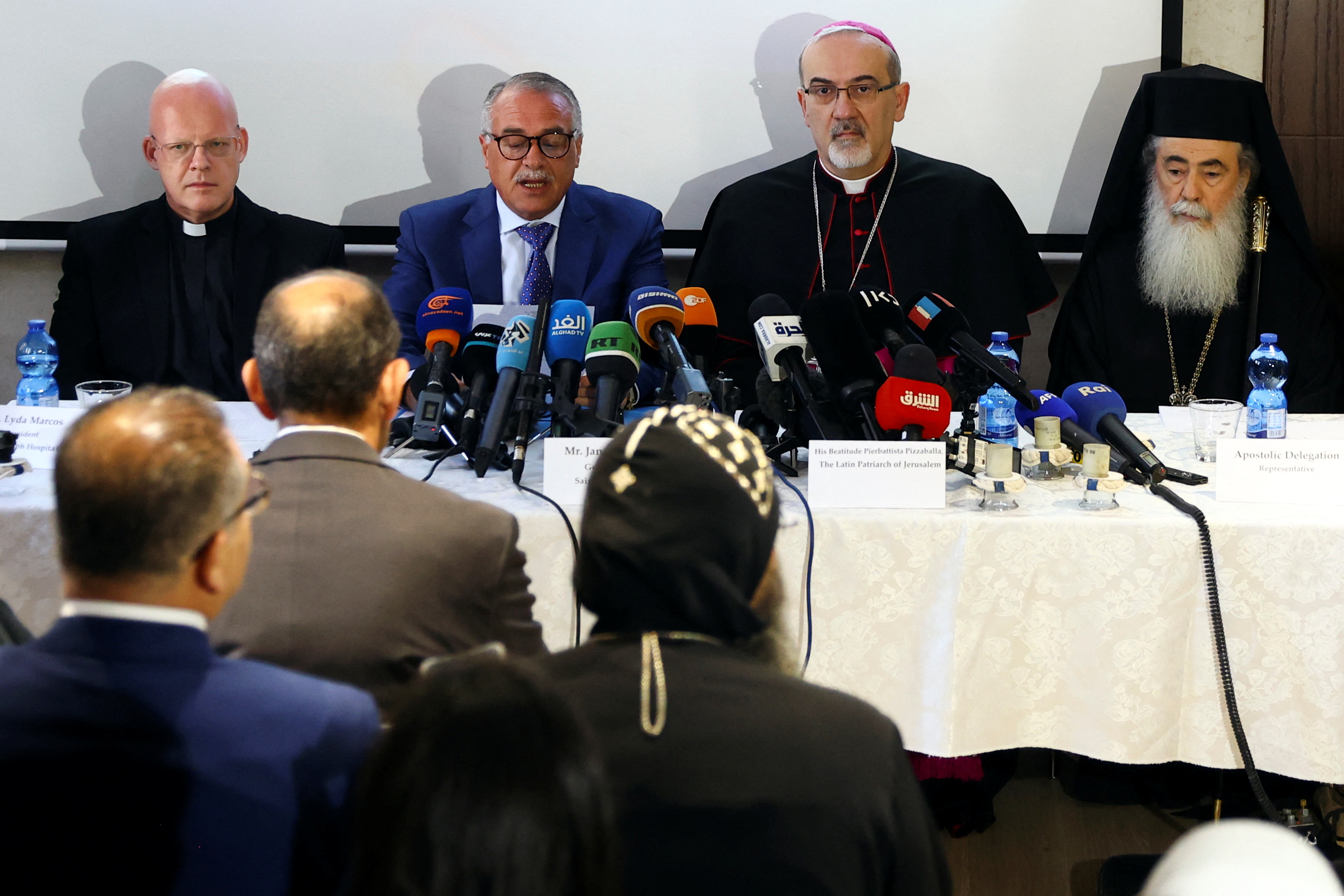 Spiritual leaders attend a newa conference regarding the funeral of Al Jazeera reporter Shireen Abu Akleh, in Jerusalem