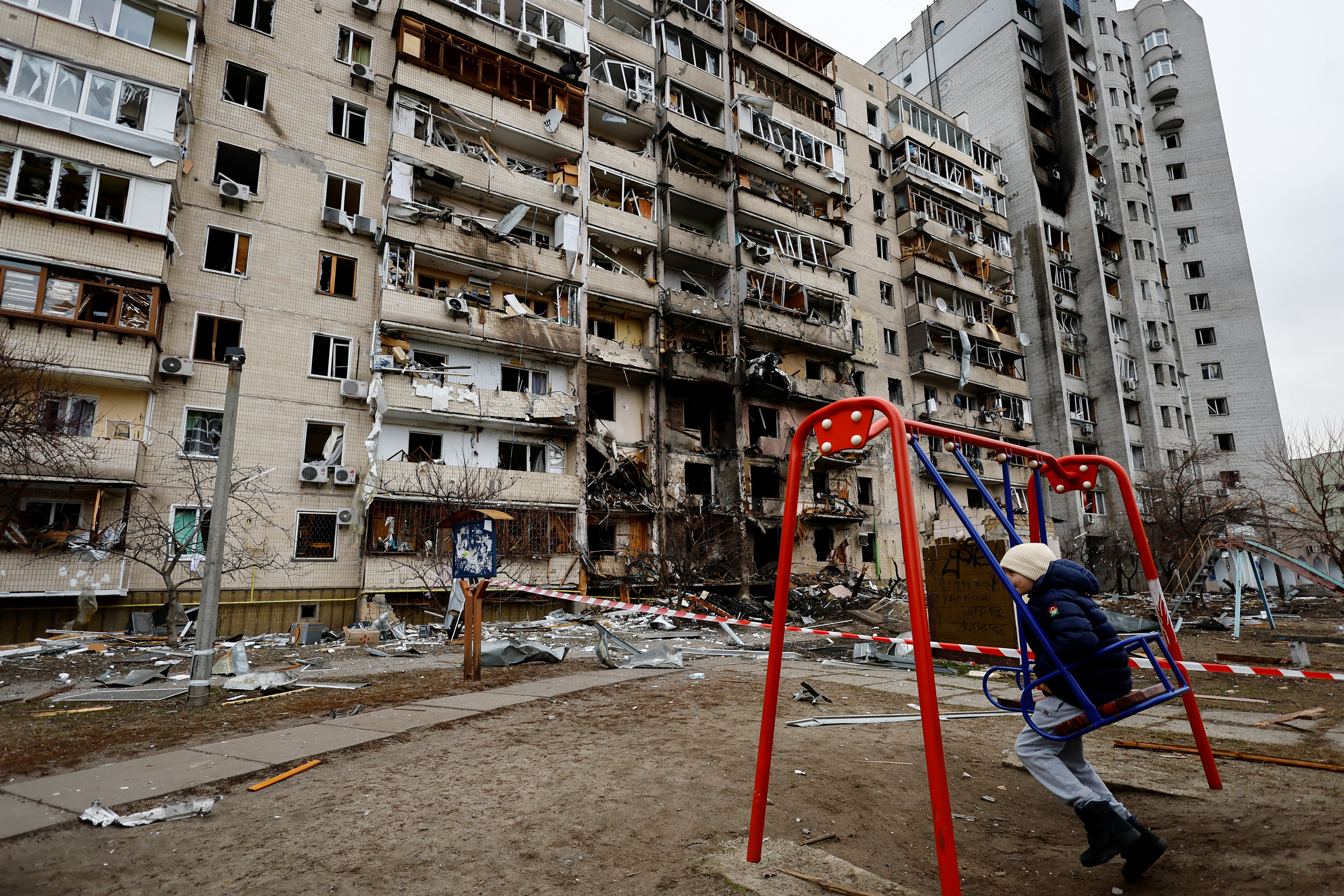 A residential building is damaged, after Russia launched a massive military operation against Ukraine, in Kyiv
