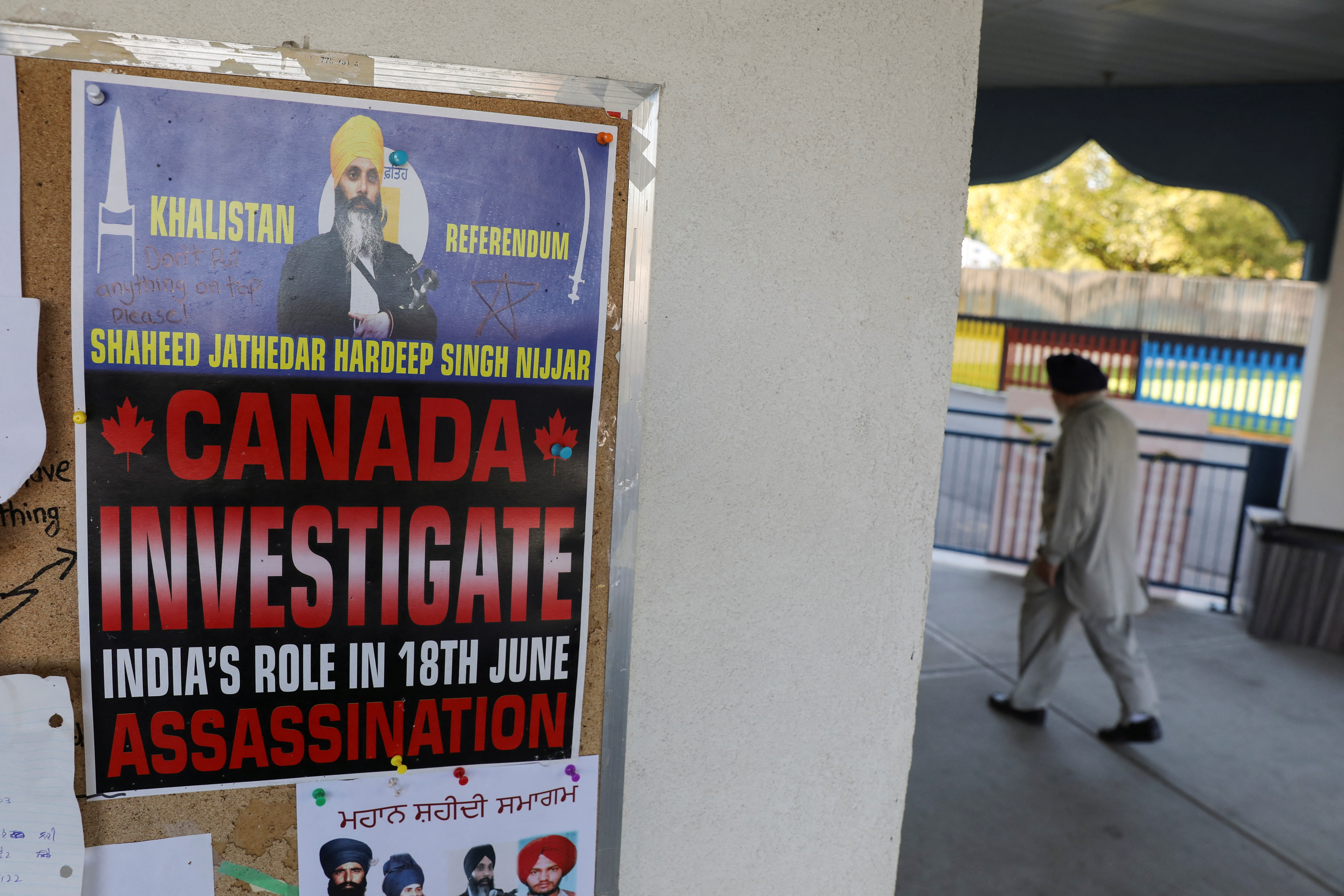 A sign asking for an investigation on India's role in the killing of Sikh leader Hardeep Singh Nijjar is seen at the Guru Nanak Sikh Gurdwara temple, in Surrey