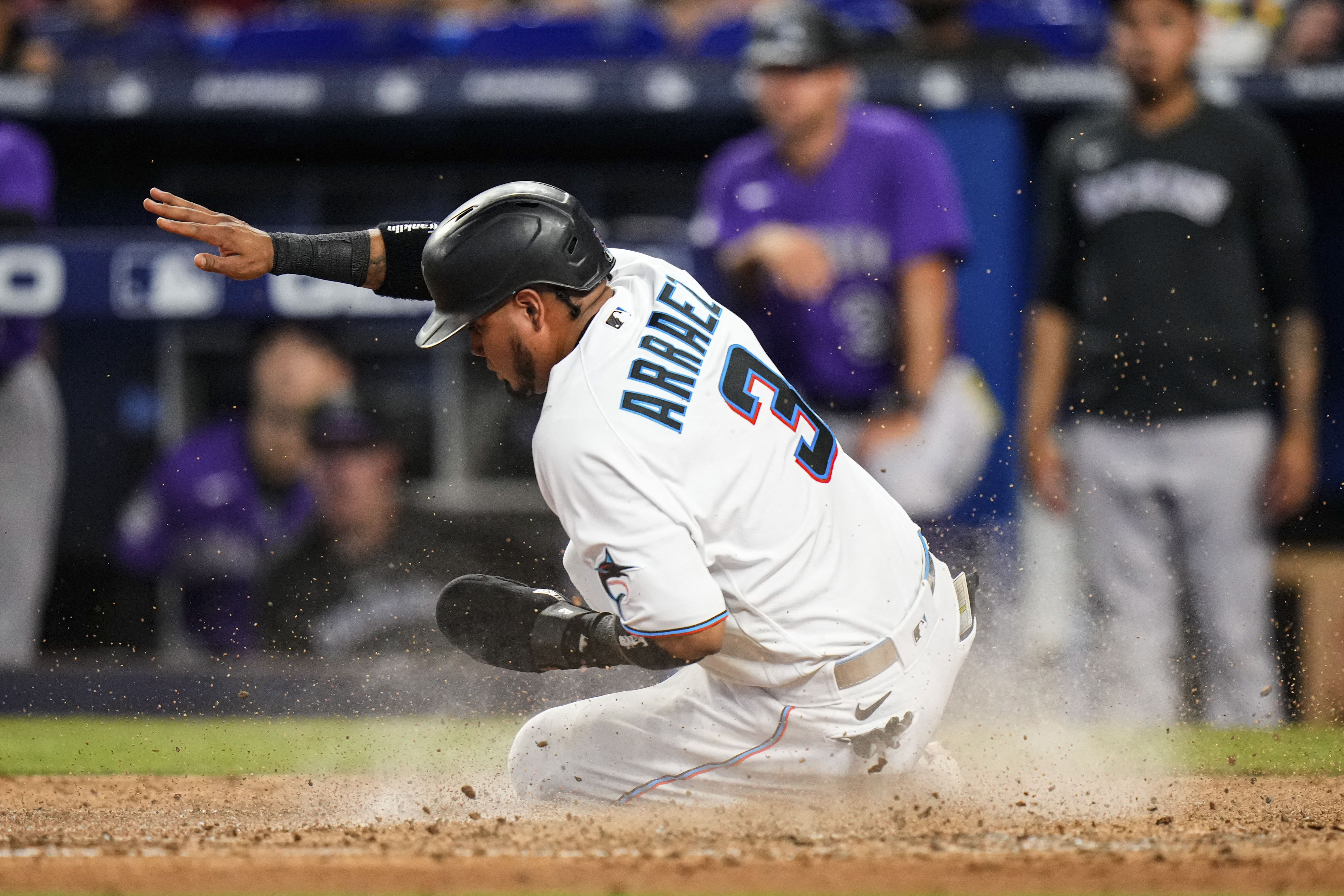 Arraez's RBI single in the 10th helps Marlins end 8-game slide with a 3-2  victory over the Rockies