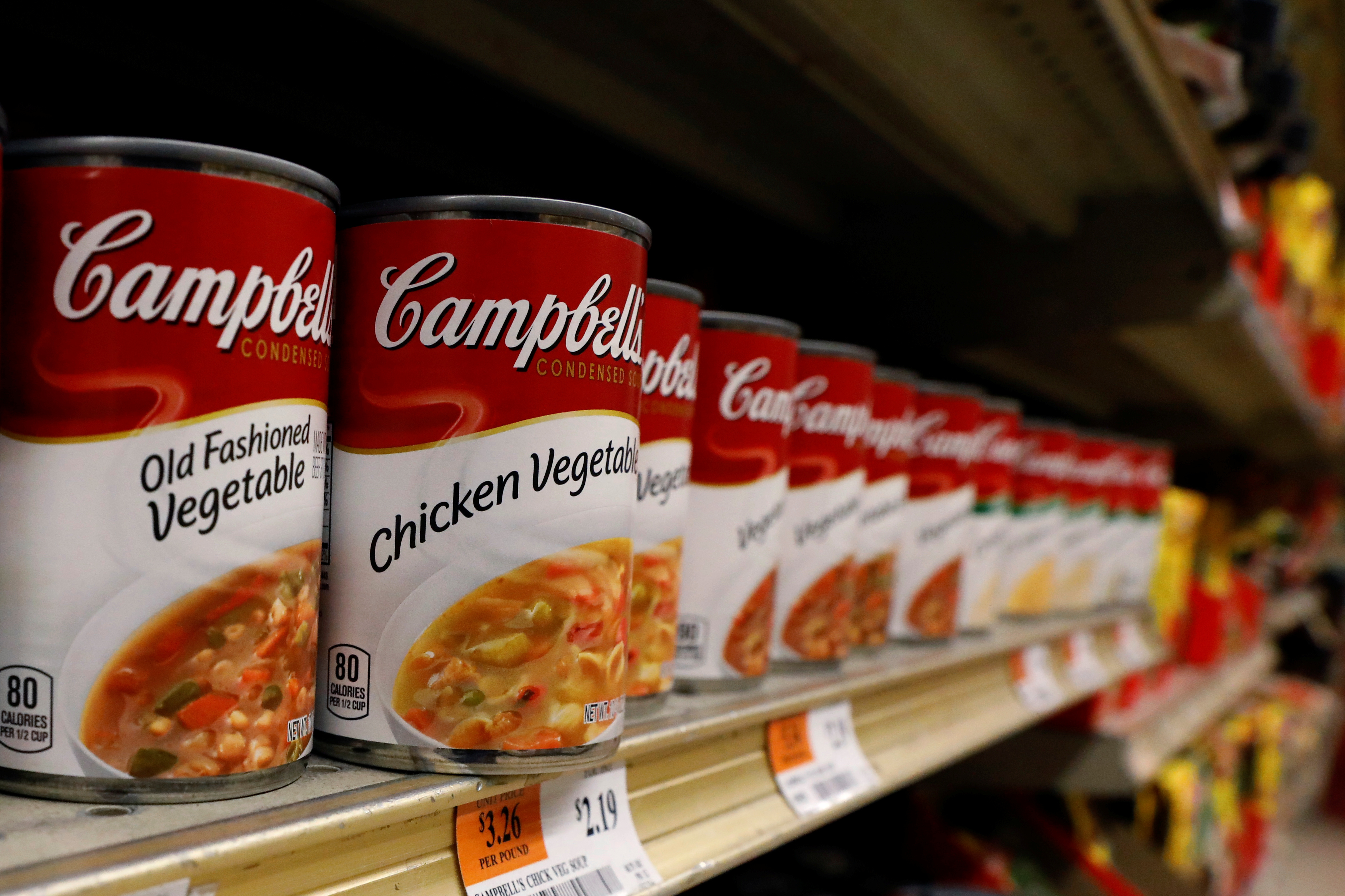 Cans of Campbell's Soup are displayed in a supermarket in New York