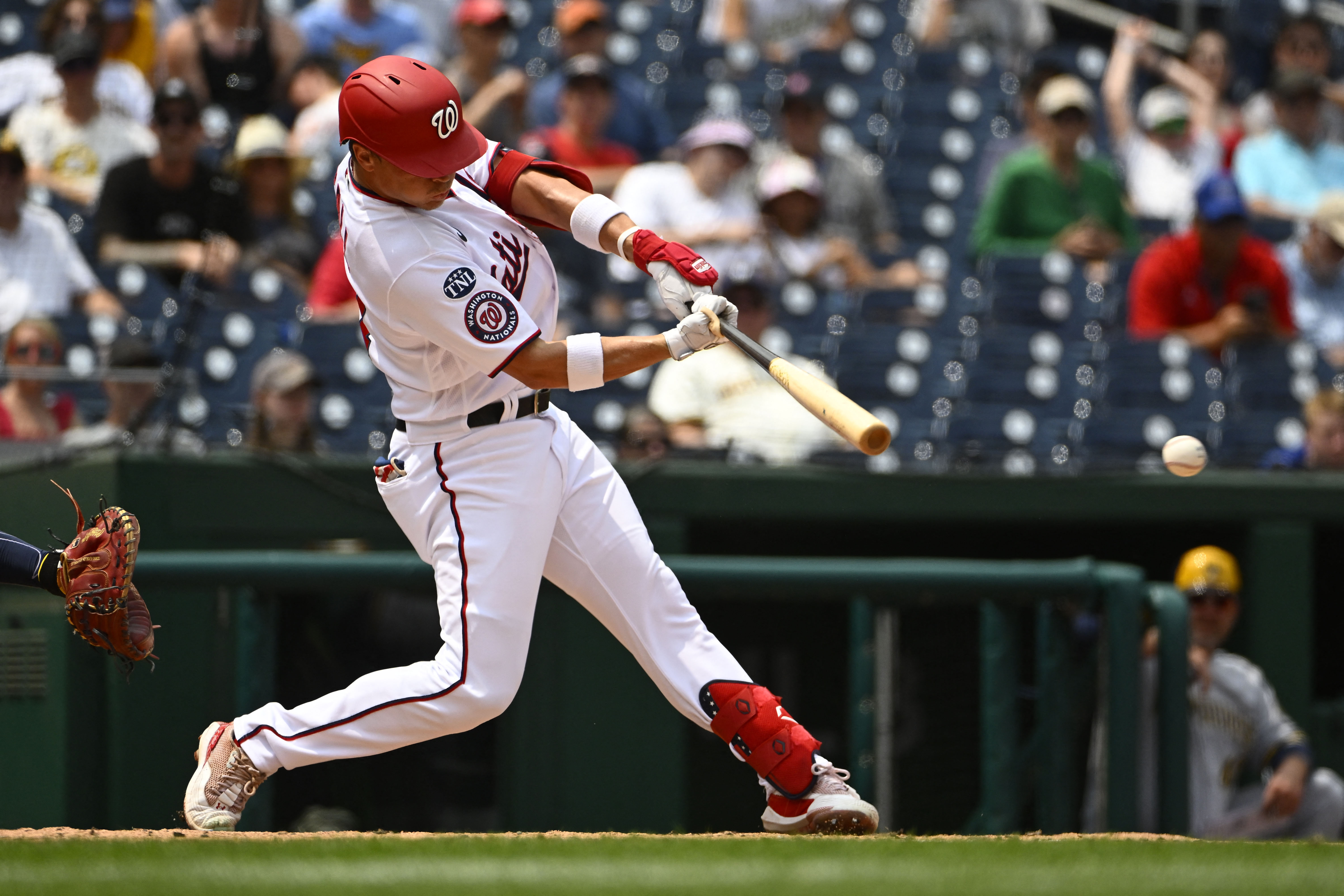 Nationals get help pulling off late rally vs. Brewers