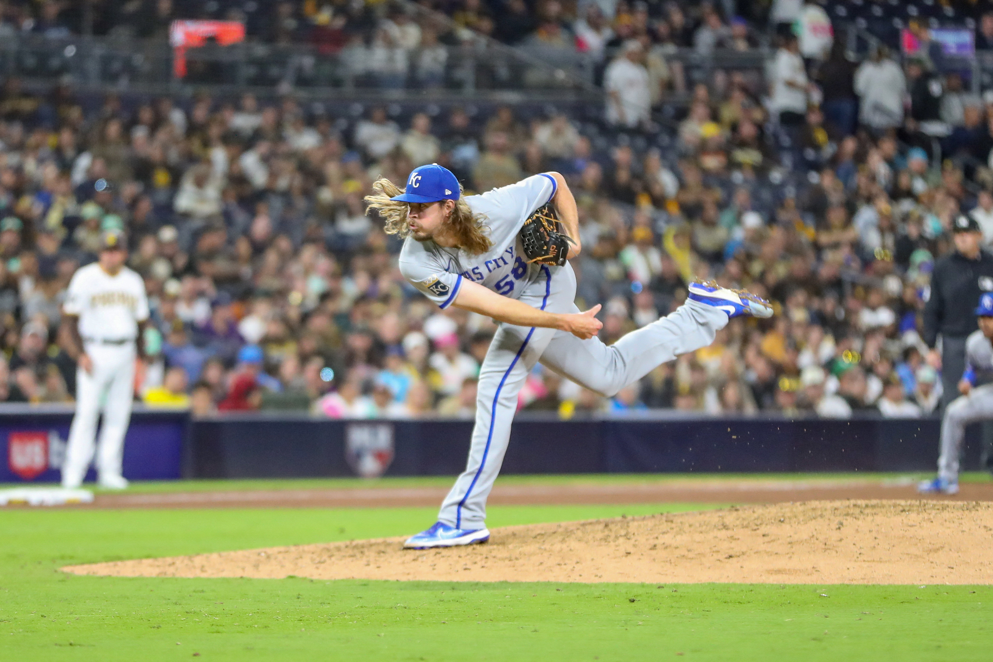 Dodgers' 12-game win streak ends; Singer, Royals blank LA