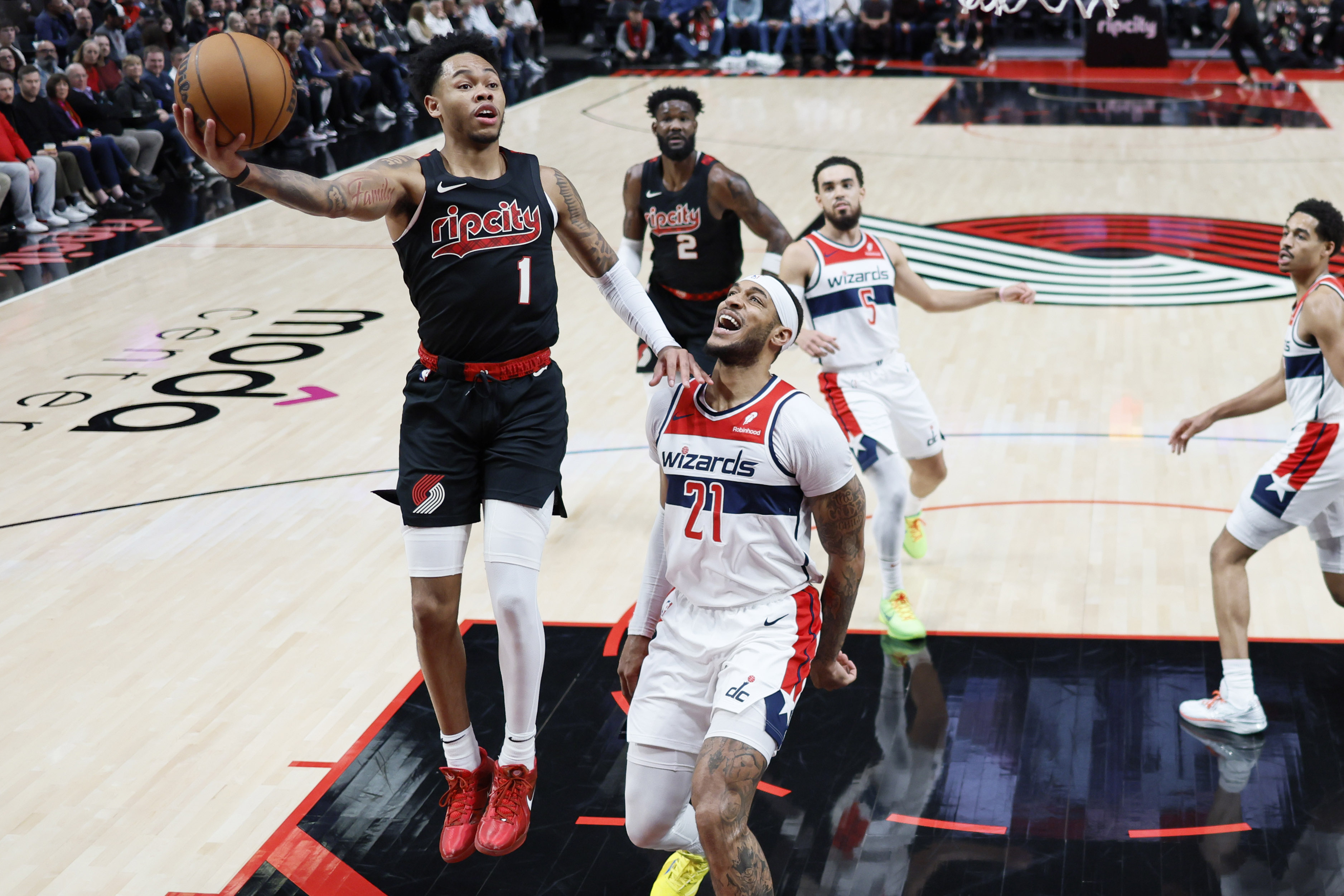 Wizards hold off Blazers' late comeback attempt | Reuters