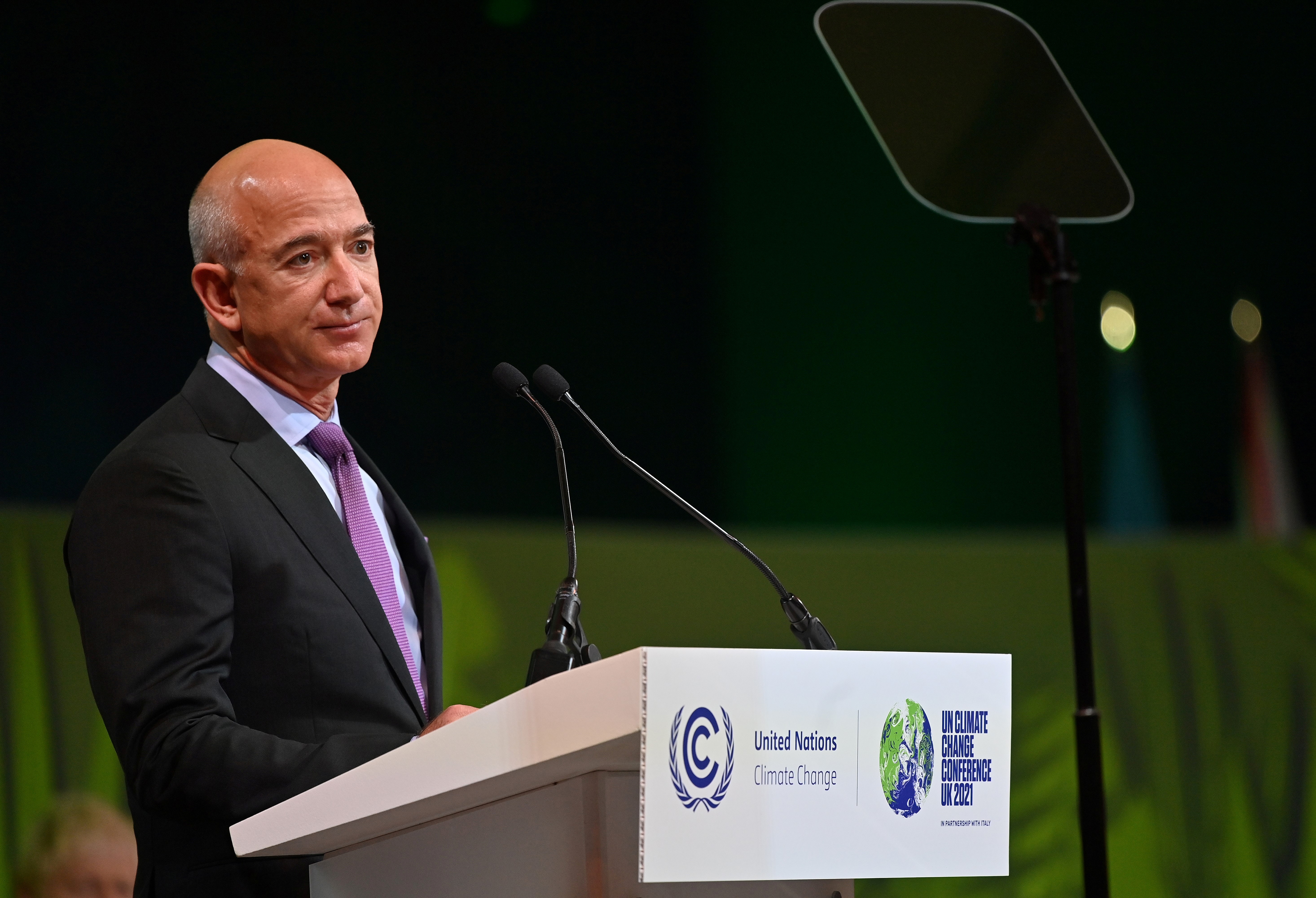 Amazon CEO Jeff Bezos gestures as he delivers a speech during the UN Climate Change Conference (COP26) in Glasgow, Scotland, Britain, November 2, 2021.