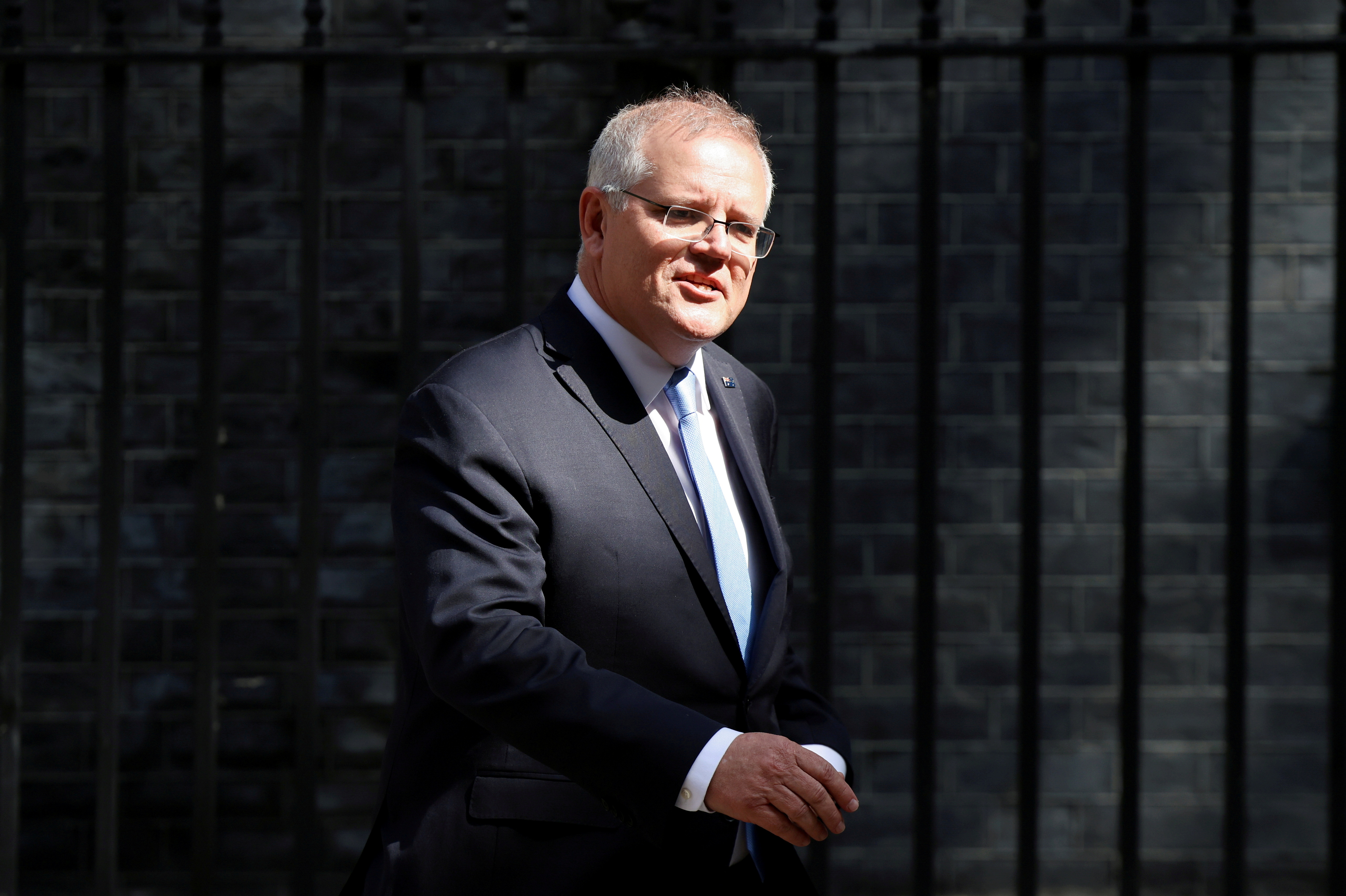 Australian Prime Minister Scott Morrison leaves Downing Street in London, Britain, June 15, 2021. REUTERS/Henry Nicholls/File Photo