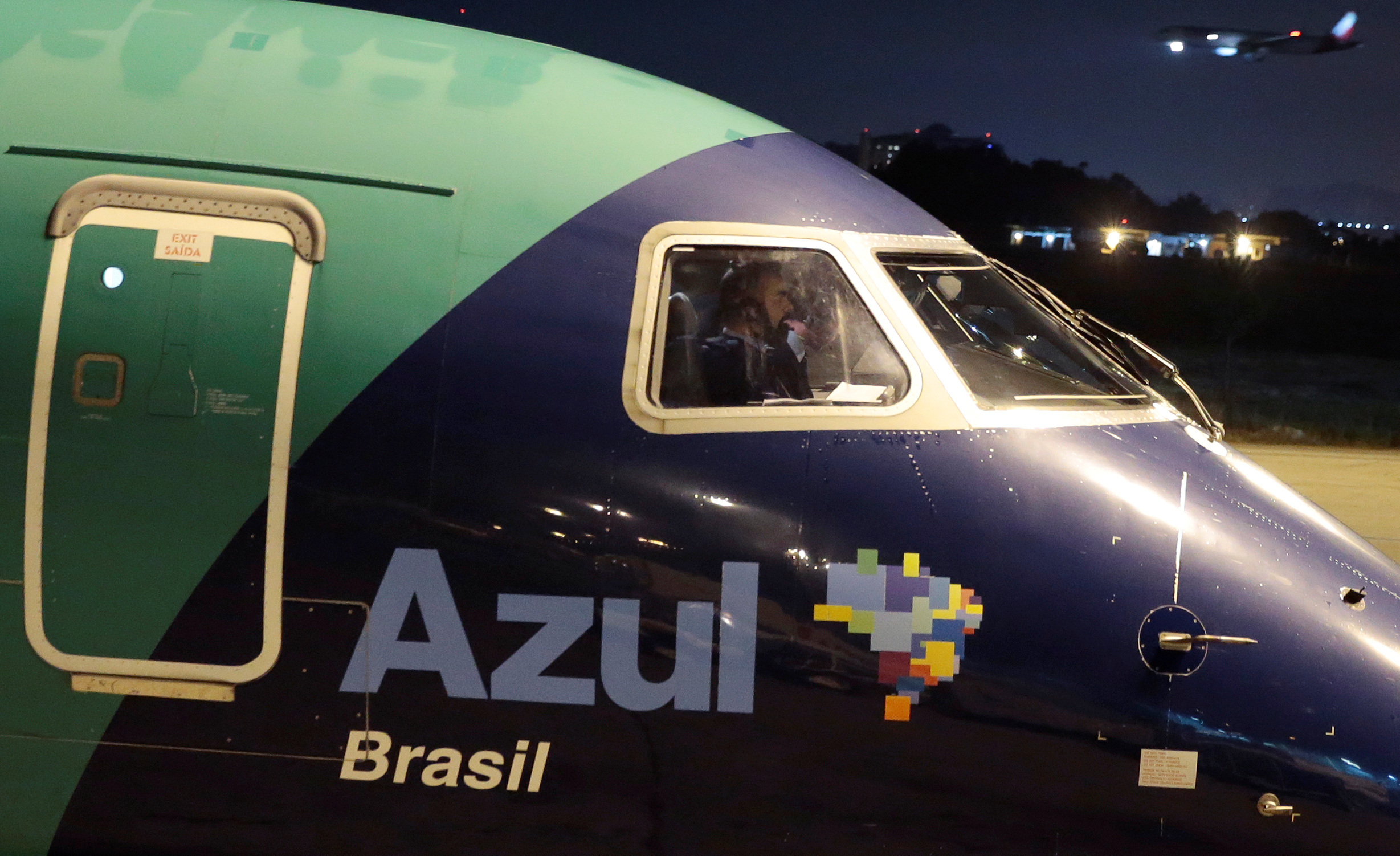 An Azul Brazilian Airlines Embraer 195 plane prepares to take off at International Airport in Guarulhos