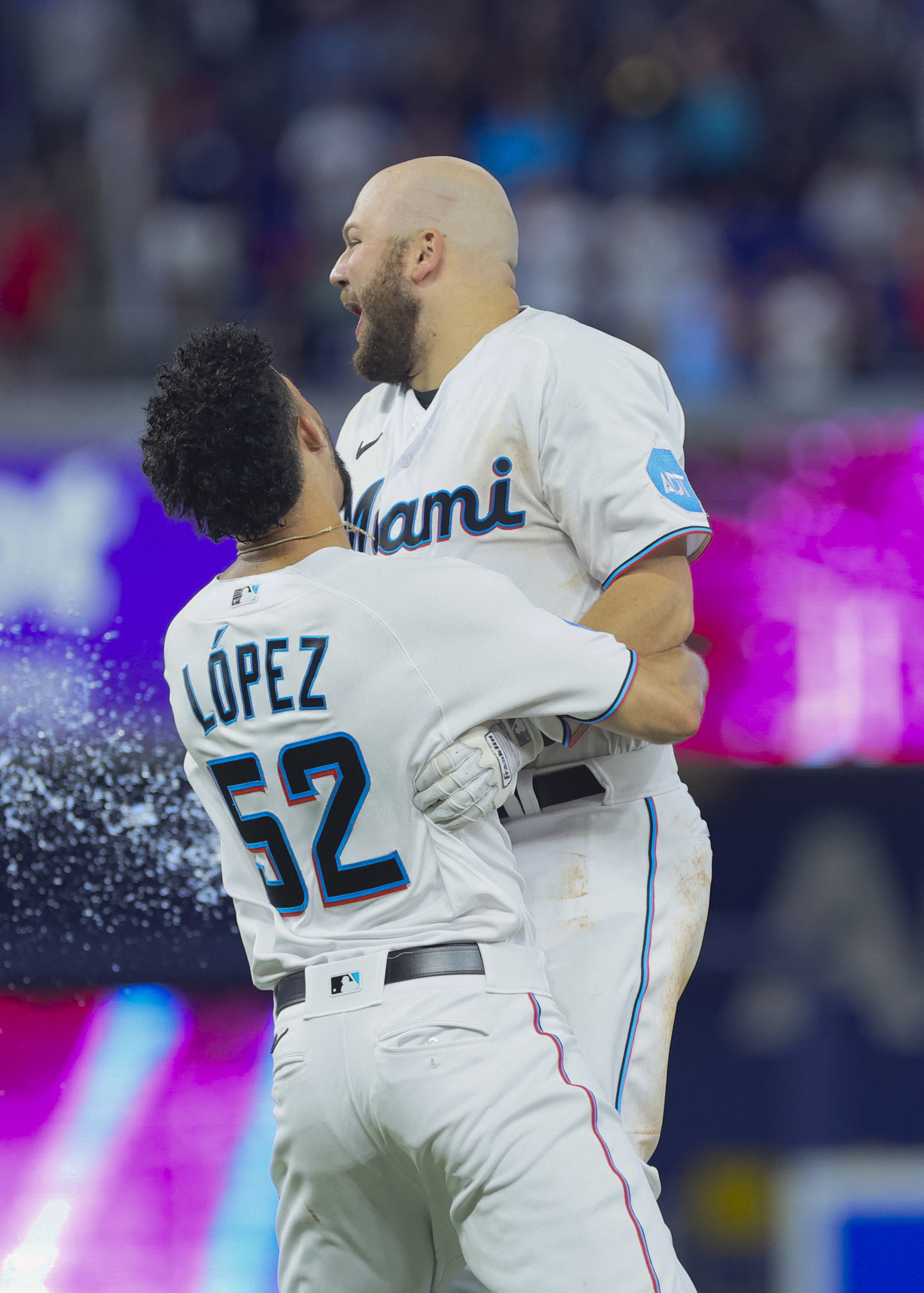 Miami Marlins' Jake Burger hits a walk off single to win the game during  the ninth inning of a baseball game against the New York Yankees, Sunday,  Aug. 13, 2023, in Miami.