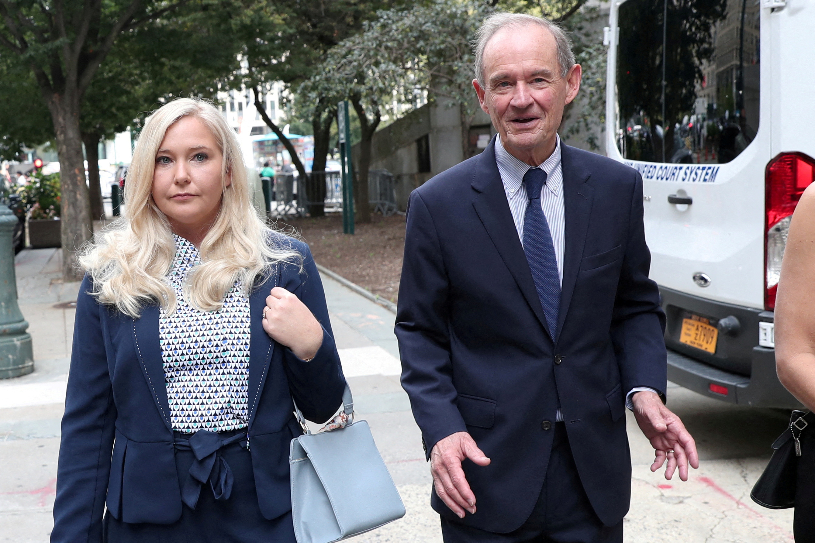 Lawyer David Boies arrives with his client Virginia Giuffre for hearing in the criminal case against Jeffrey Epstein, who died this month in what a New York City medical examiner ruled a suicide, at Federal Court in New York