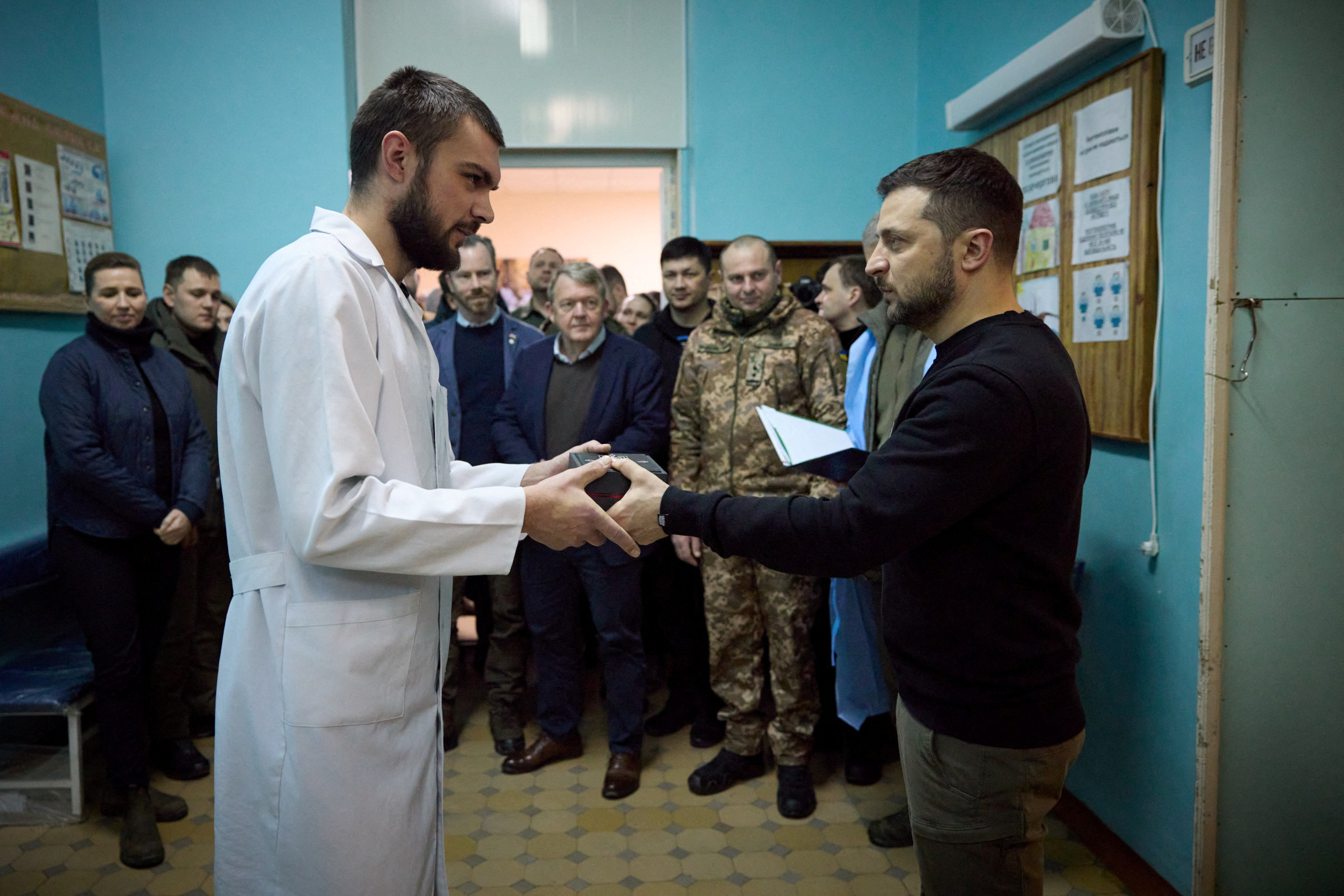 Ukraine's President Zelenskiy and Denmark's PM Frederiksen visit Ukrainian servicemen at a military hospital in Mykolaiv