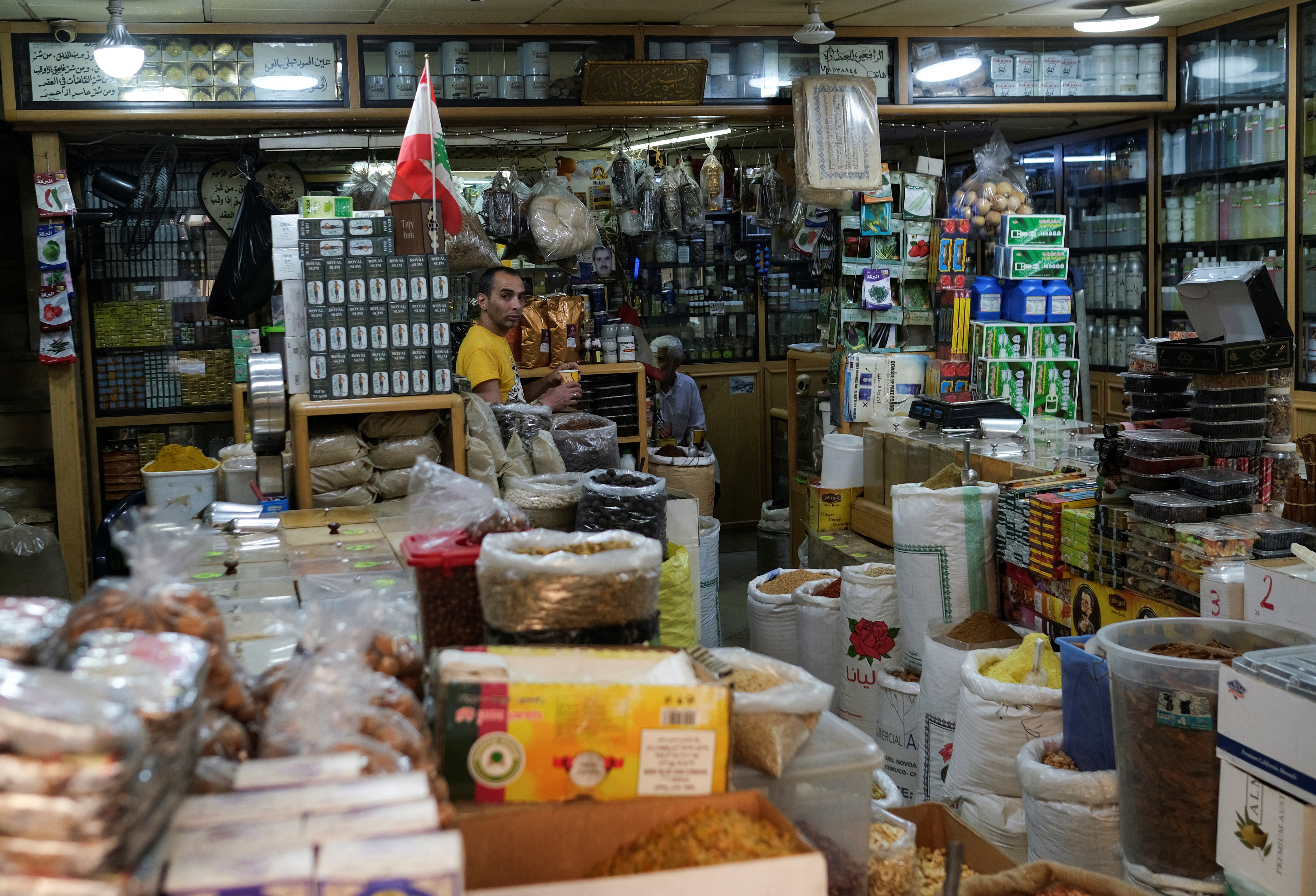 Goods are displayed for sale inside the shop of Omar al-Rafie in Tripoli