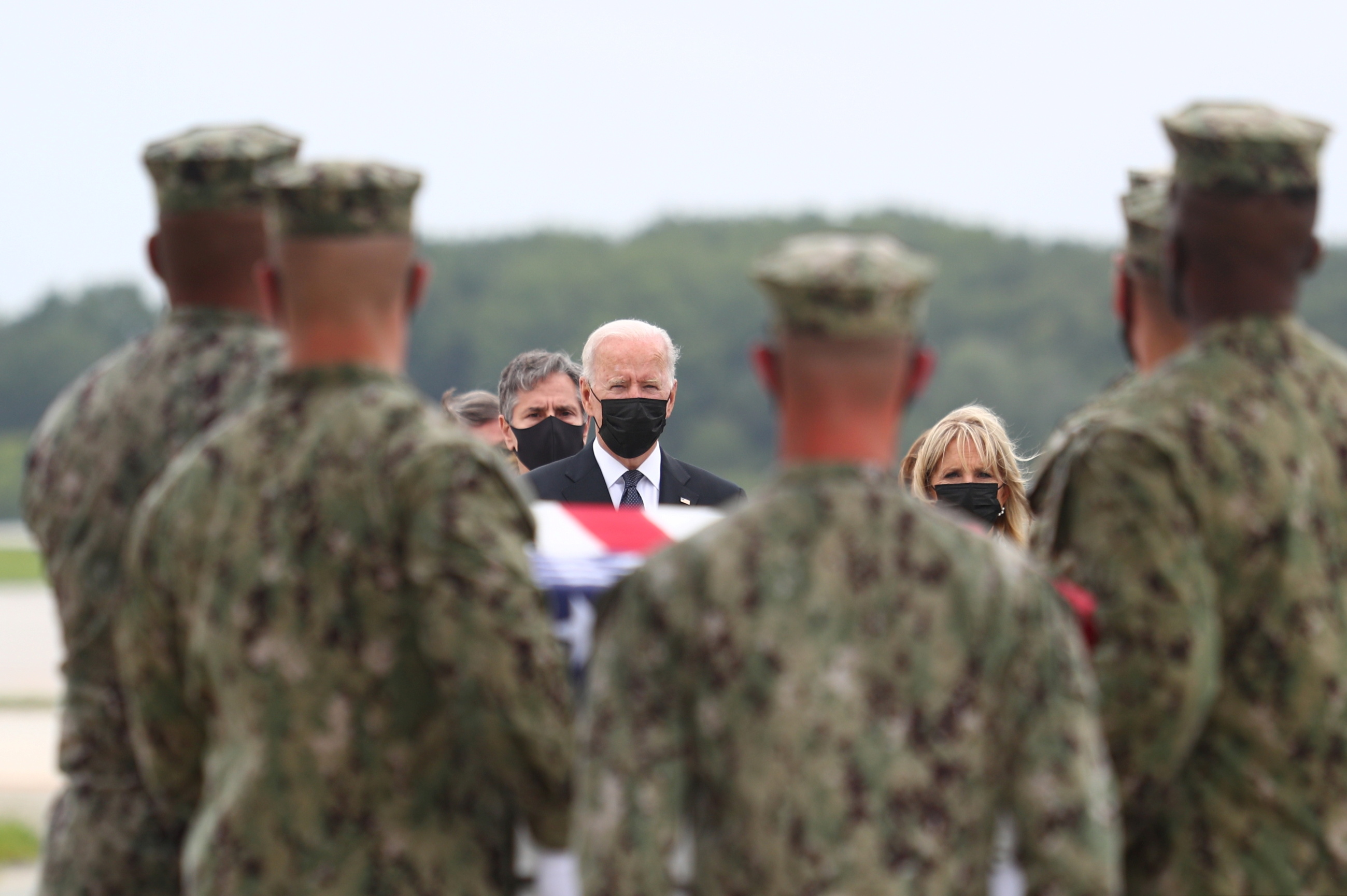 U.S. President Joe Biden attends the dignified transfer of the remains of U.S. Military service members who were killed by a suicide bombing at the Hamid Karzai International Airport