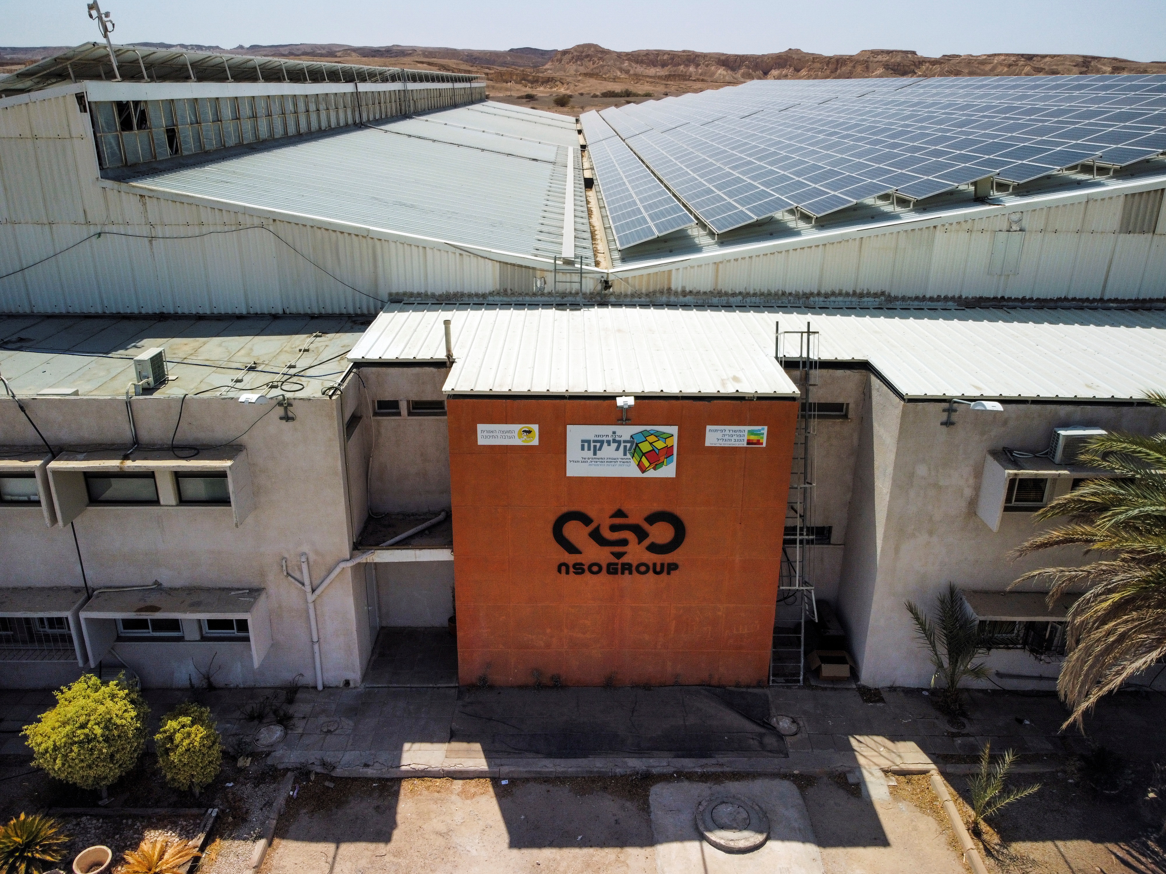 An aerial view shows the logo of Israeli cyber firm NSO Group at one of its branches in the Arava Desert, southern Israel