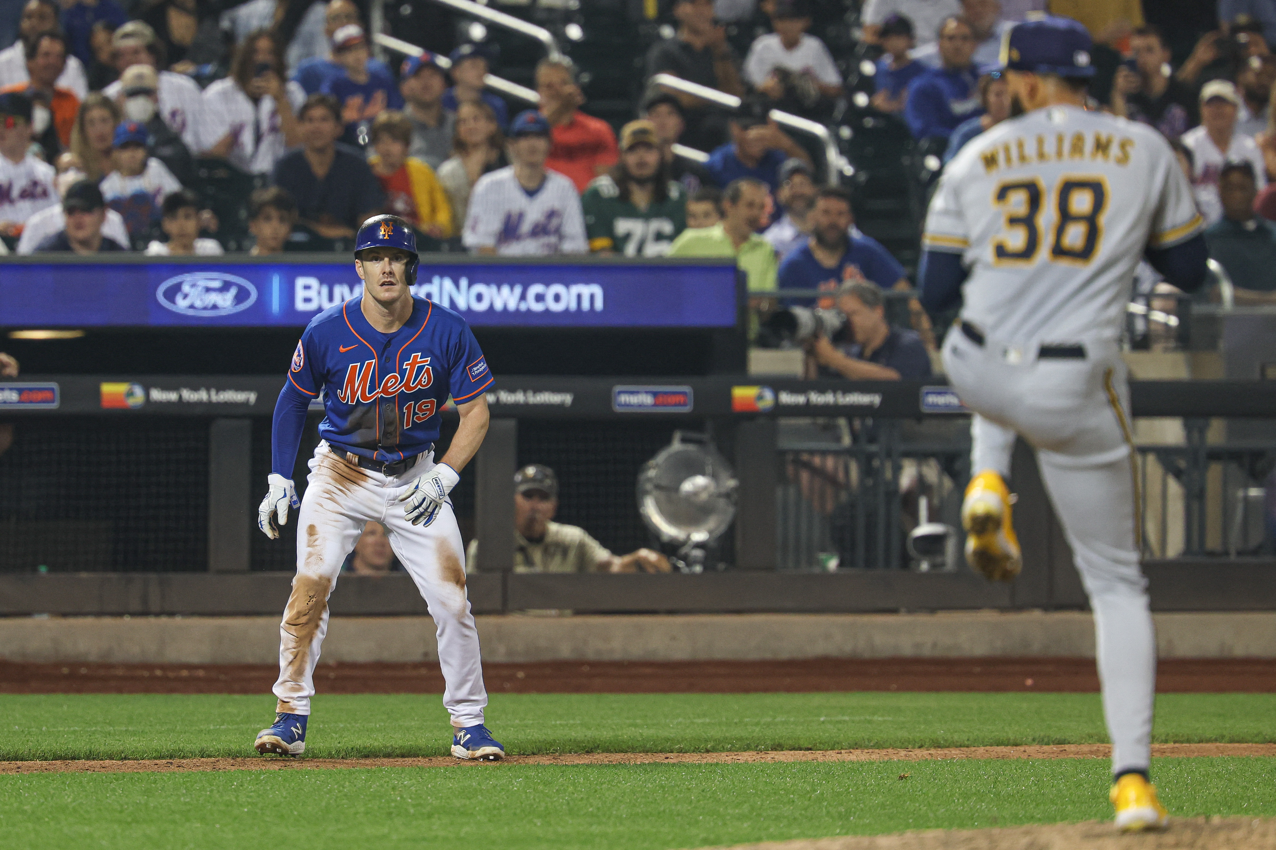 Mets leave the bases loaded while down by one when Devin Williams strikes  out Starling Marte for the save.