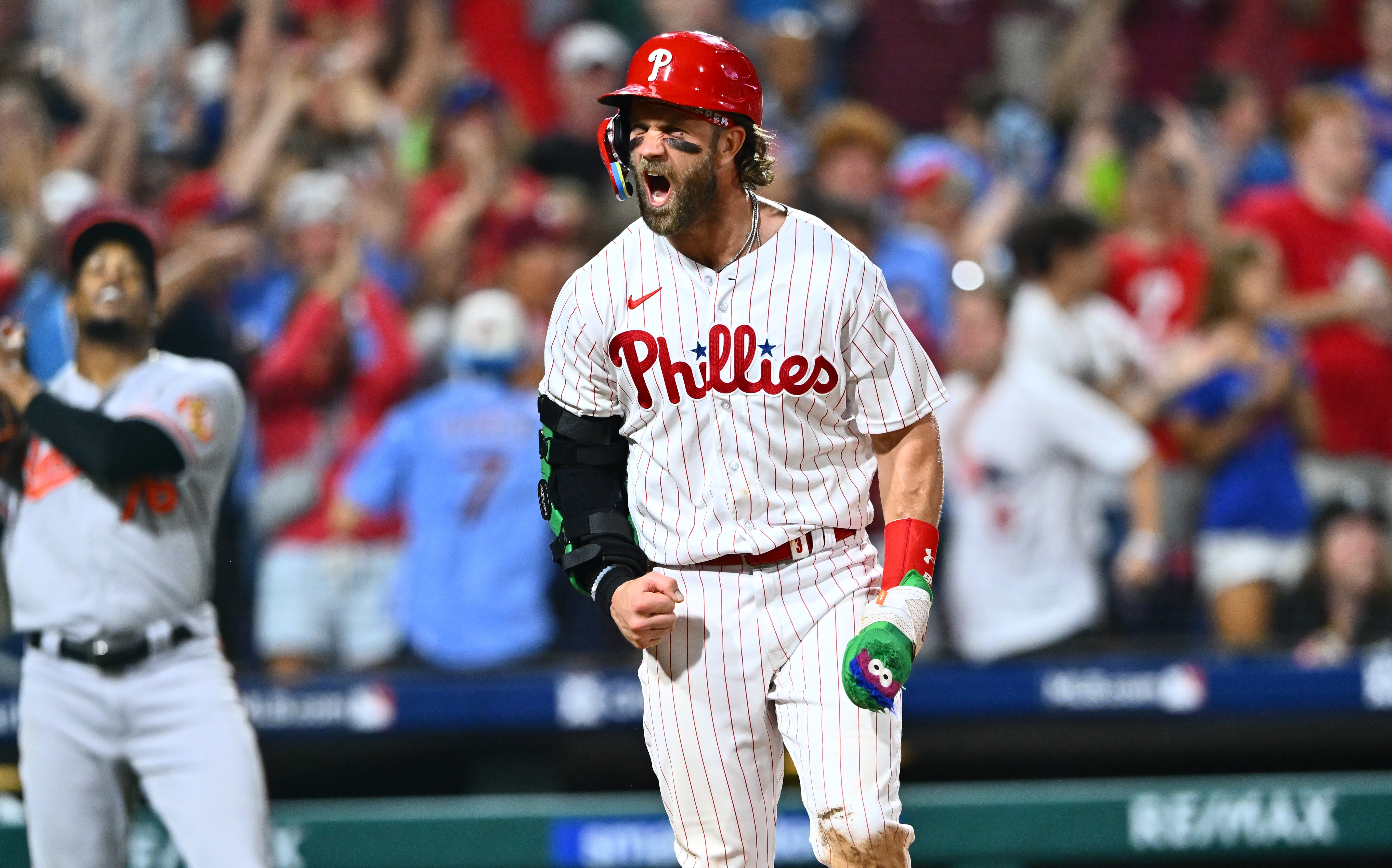 Phillies score twice in ninth for comeback win over Orioles