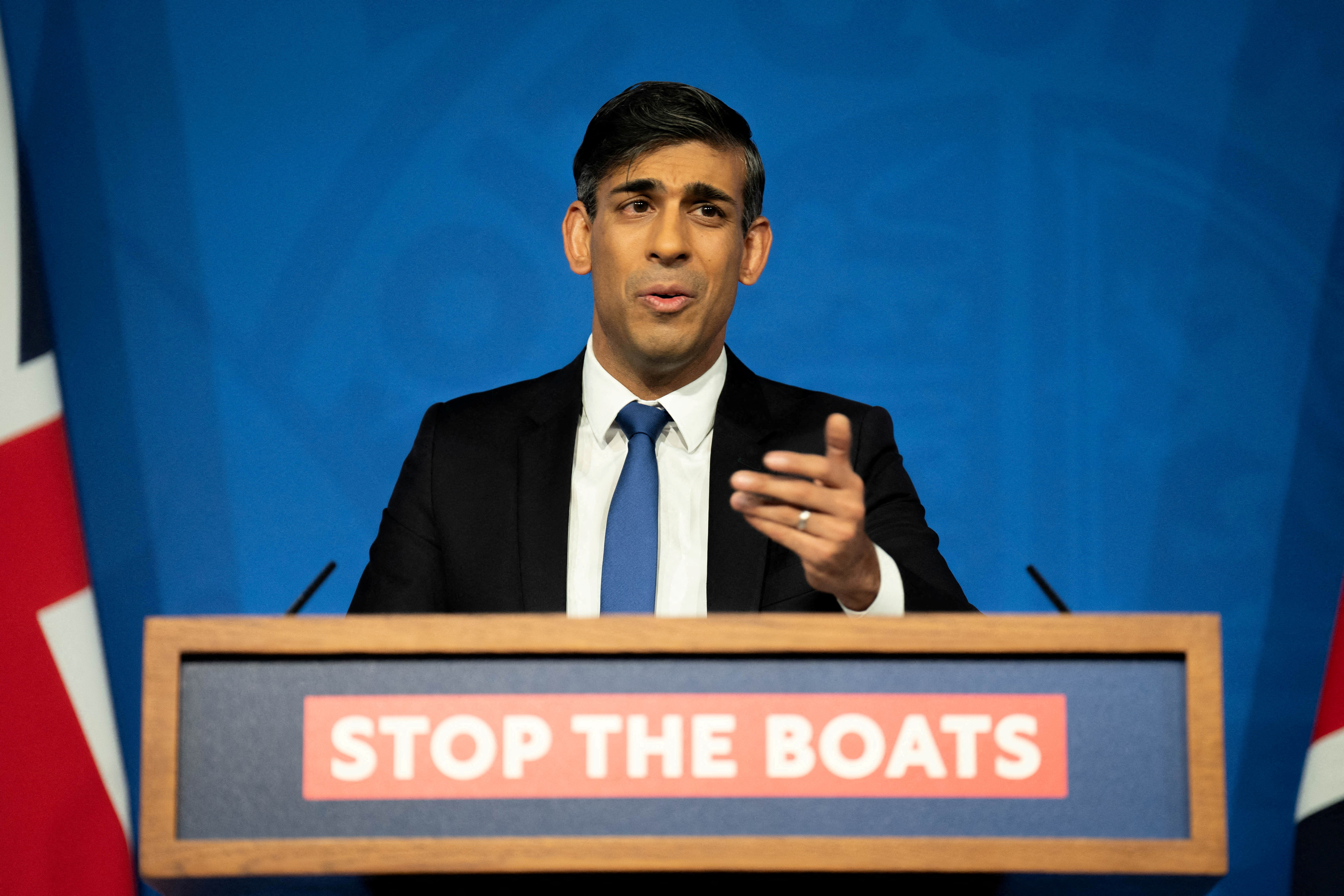 Rishi Sunak attends a press conference in the Downing Street Briefing Room