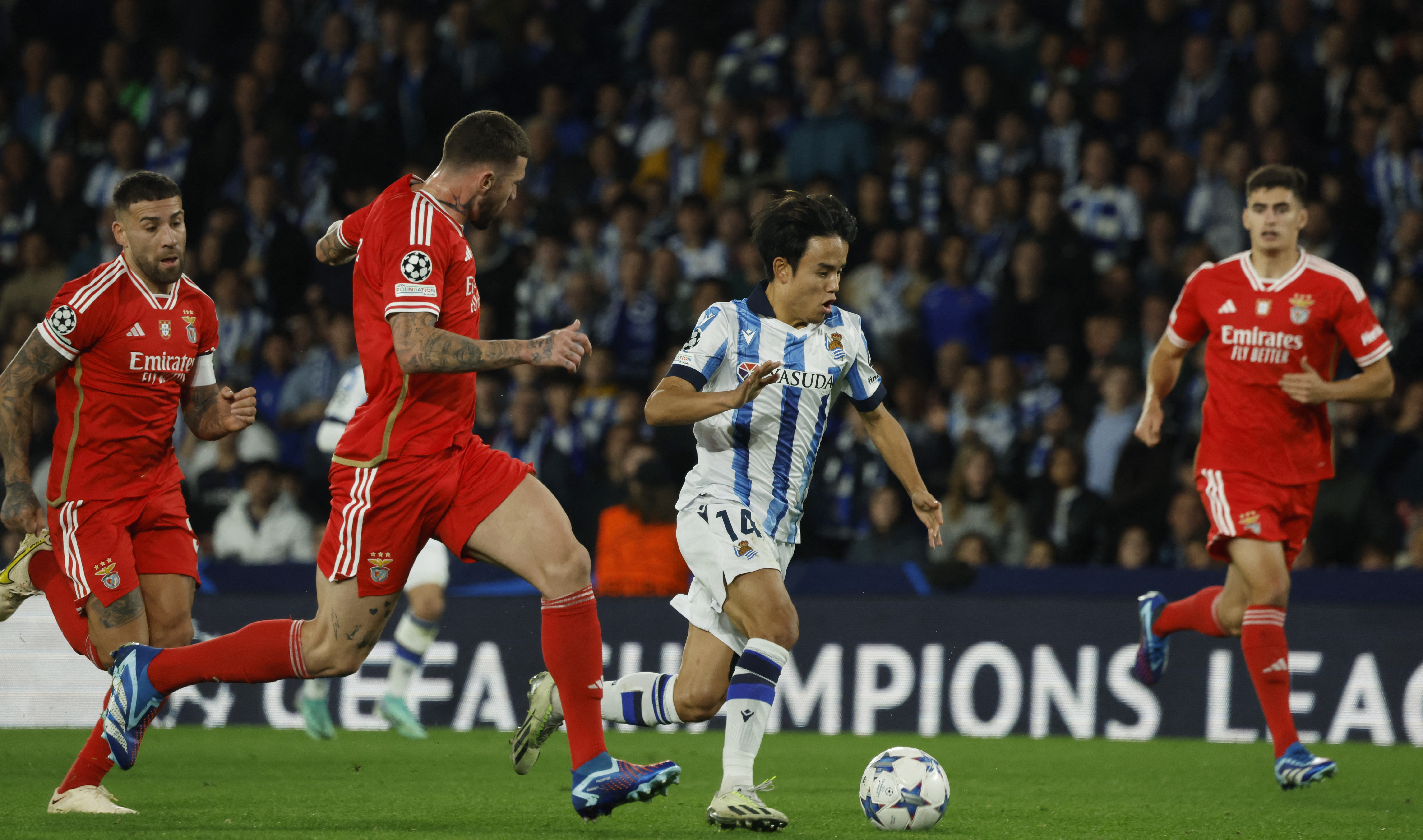 Real Sociedad outclass Benfica 3-1 to edge closer to last 16 | Reuters
