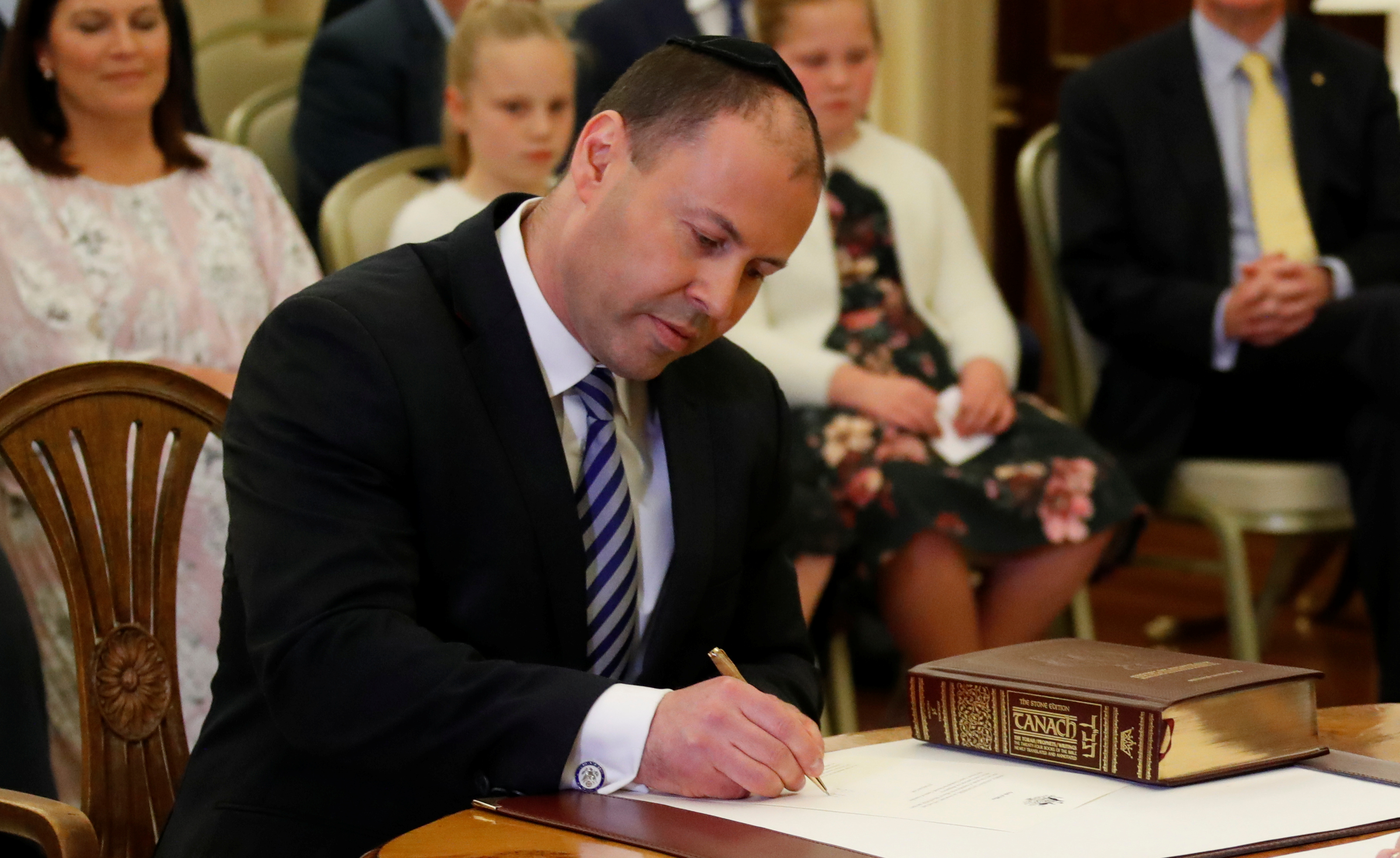 The new Treasurer Josh Frydenberg attends the swearing-in ceremony in Canberra