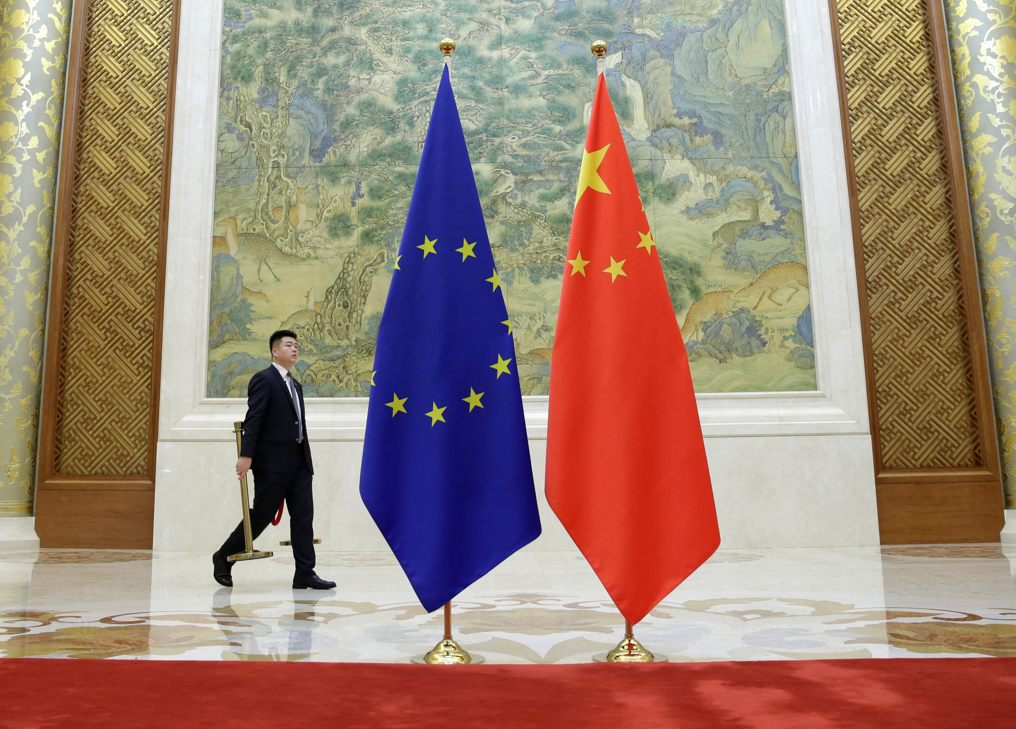 A staff member prepares for the EU-China High-level Economic Dialogue in Beijing