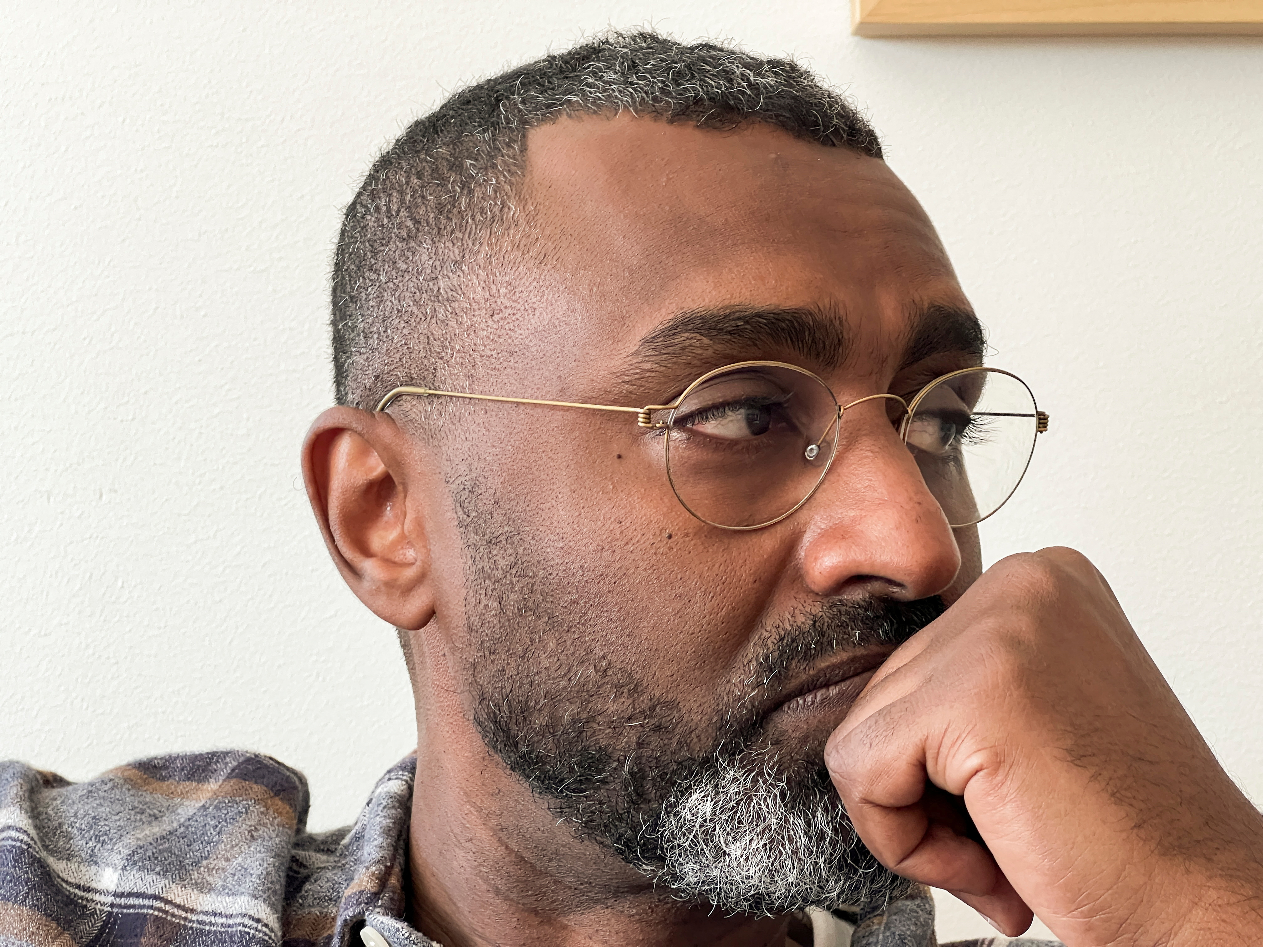 Sudanese cartoonist Khalid Albaih works at his home in Oslo