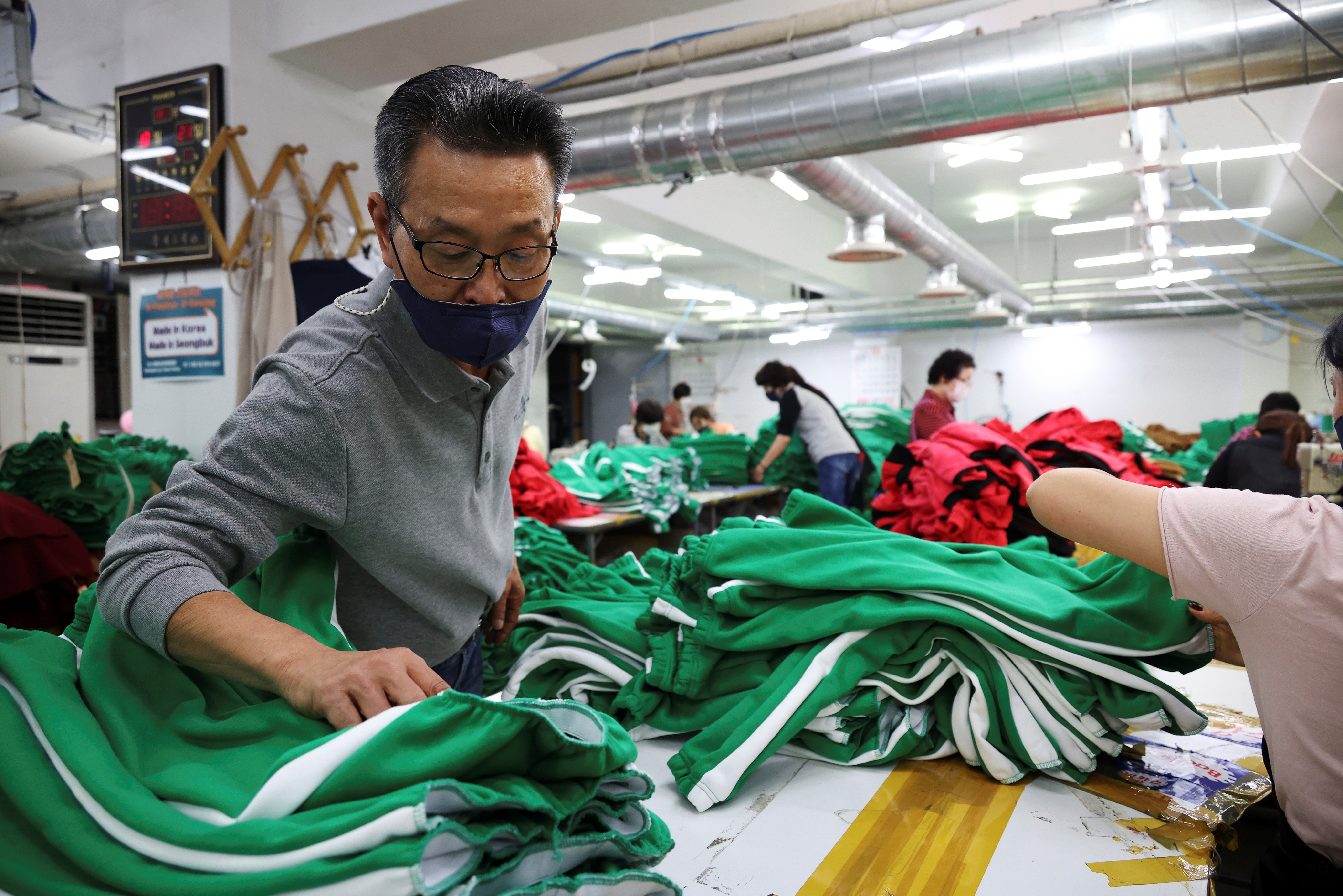 High demand for 'Squid Game' tracksuits cheers S.Korea's struggling garment  sector | Reuters