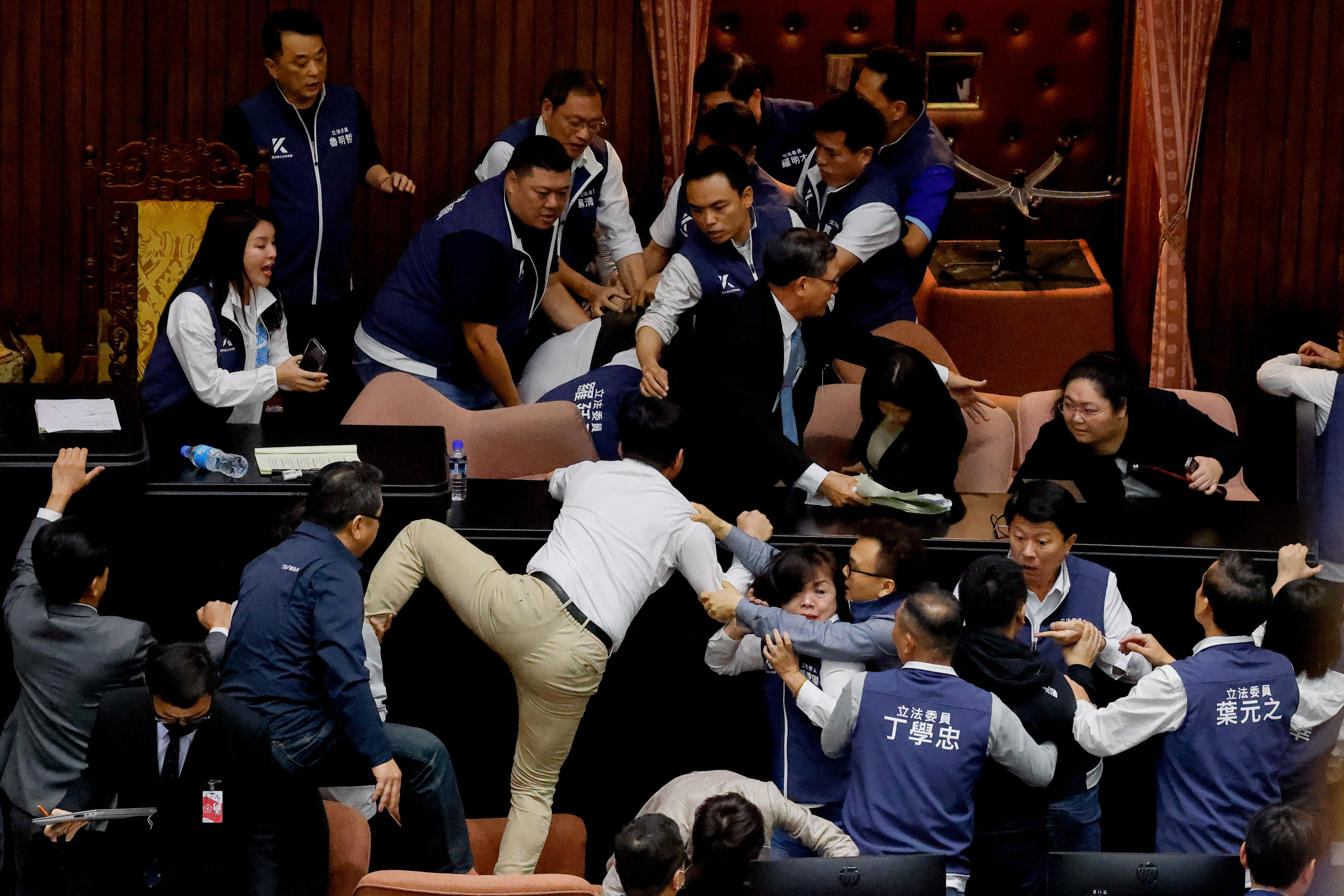 Taiwan lawmakers argue and exchange blows during a parliamentary session in Taipei