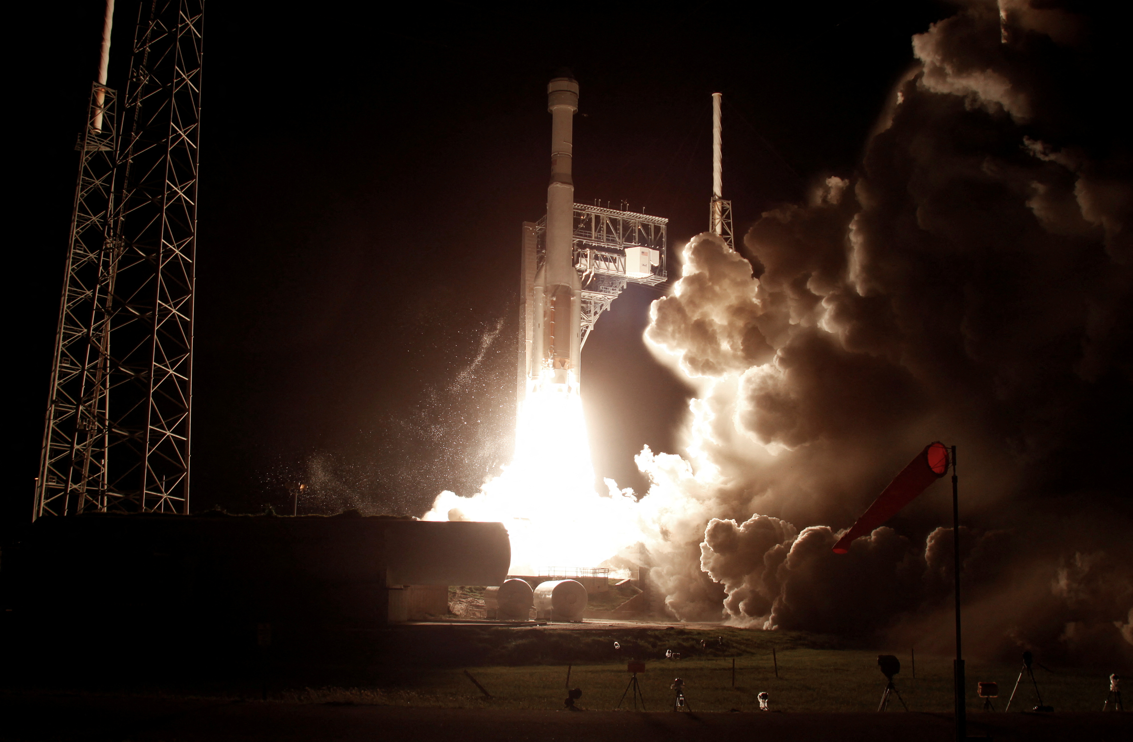 The Boeing CST-100 Starliner spacecraft, atop a ULA Atlas V rocket, lifts off for an uncrewed Orbital Flight Test to the International Space Station
