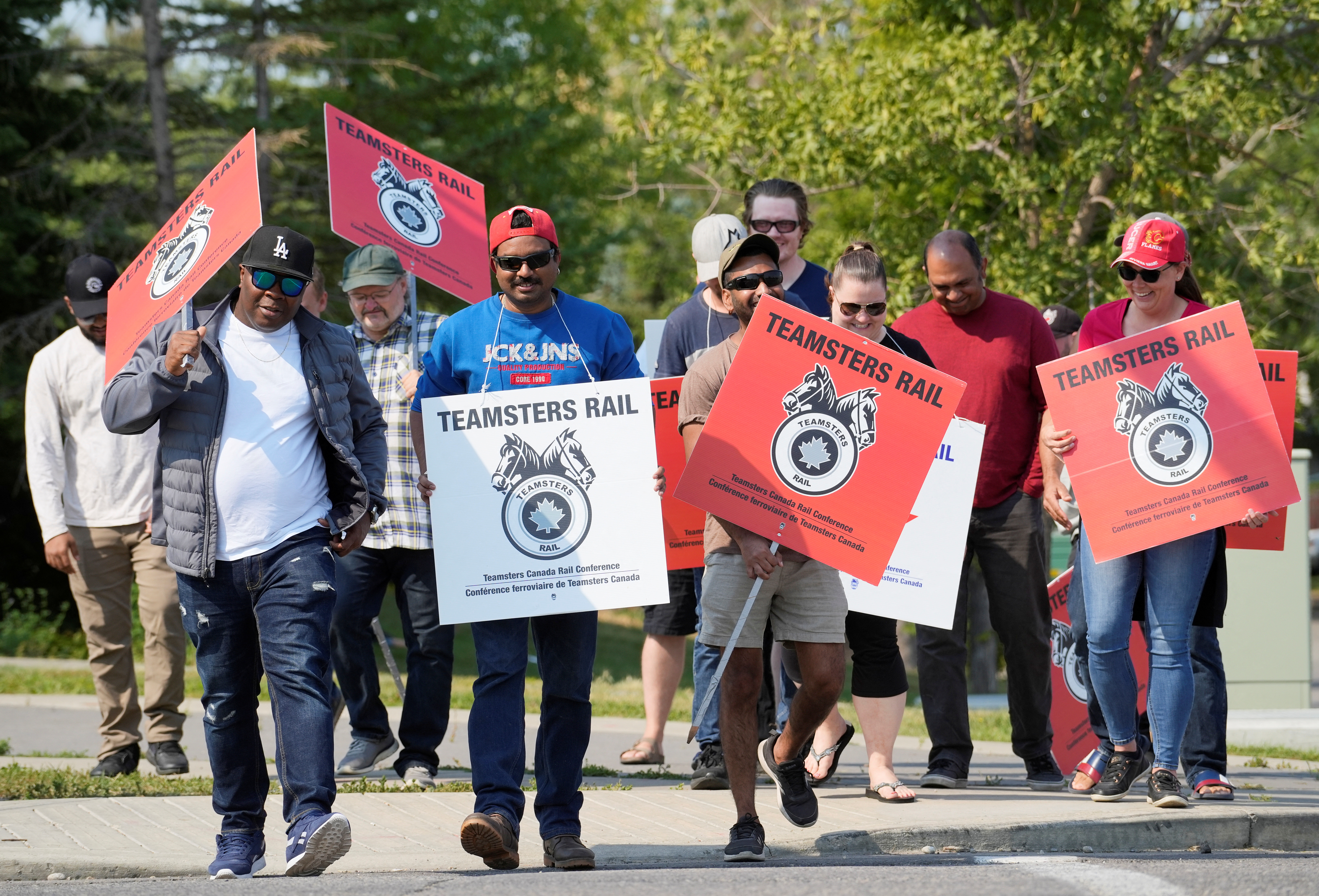 Teamsters union workers picket Canadian Pacific Kansas City (CPKC) headquarters after being locked out by the company in Calgary