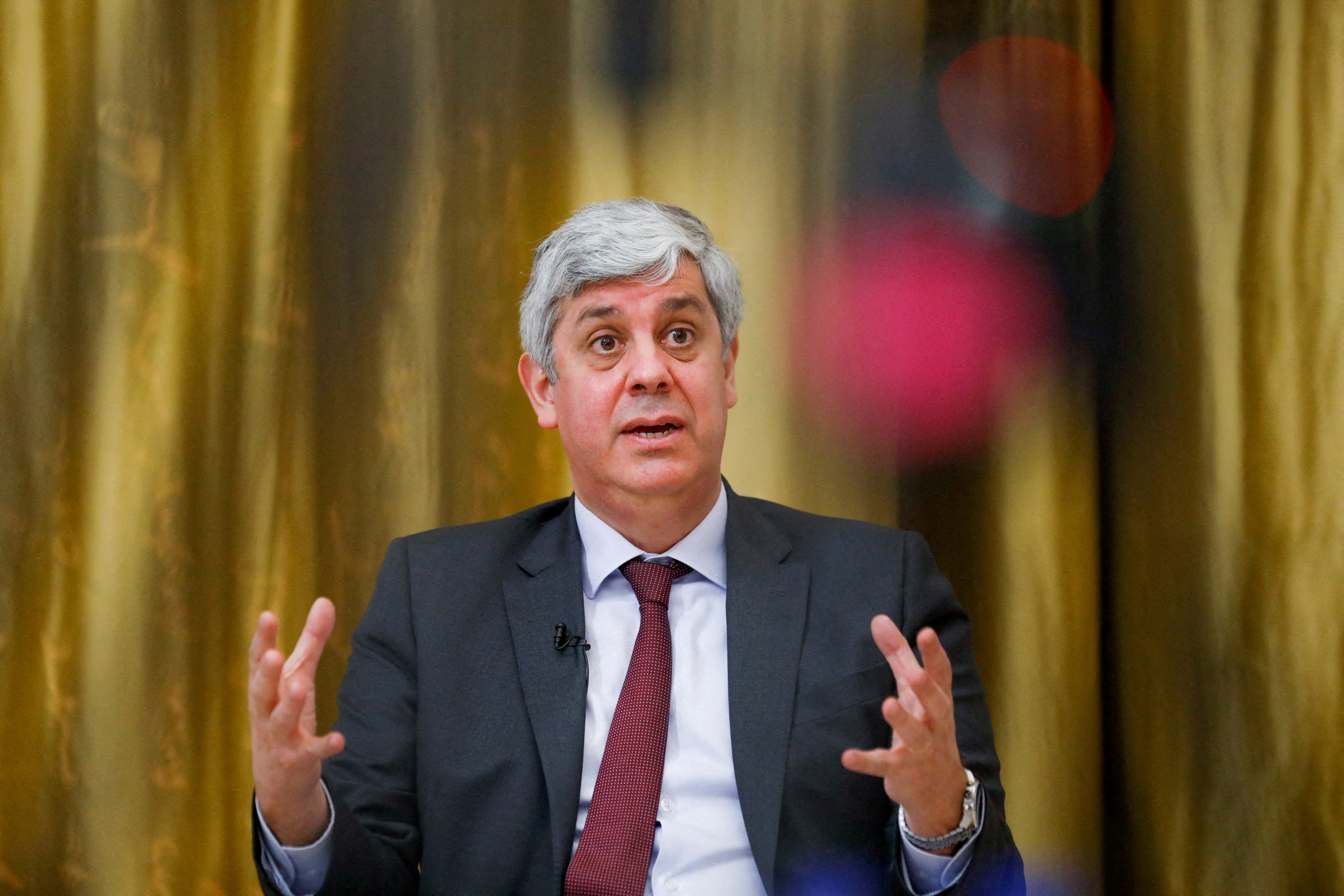 ECB governing council member Mario Centeno speaks during an interview with Reuters, in Lisbon