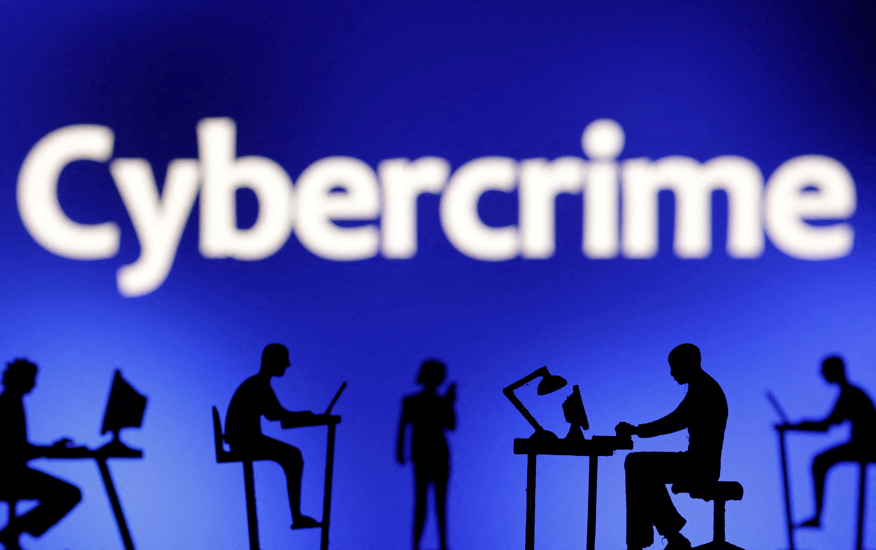 Illustration shows the word "Cybercrime\